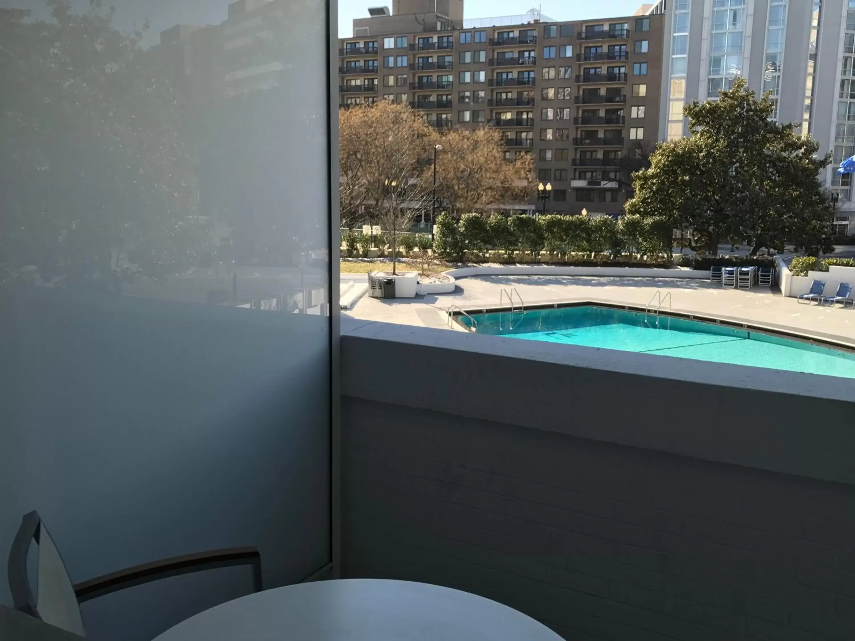 Balcony/Terrace, Pool View in Washington Plaza Hotel