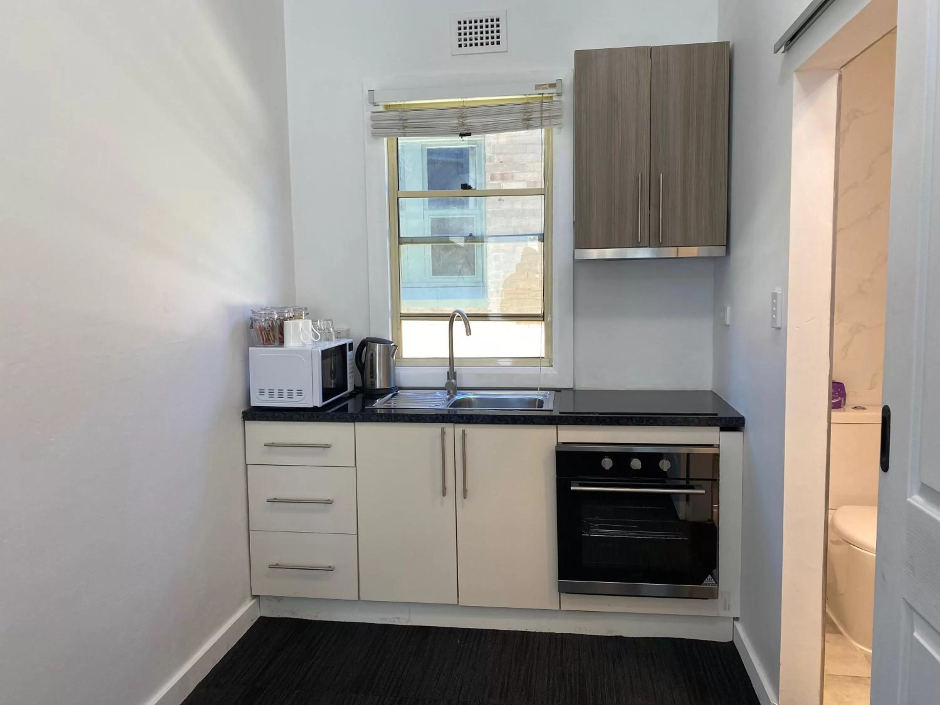 Kitchen or kitchenette in Central Motel Mudgee