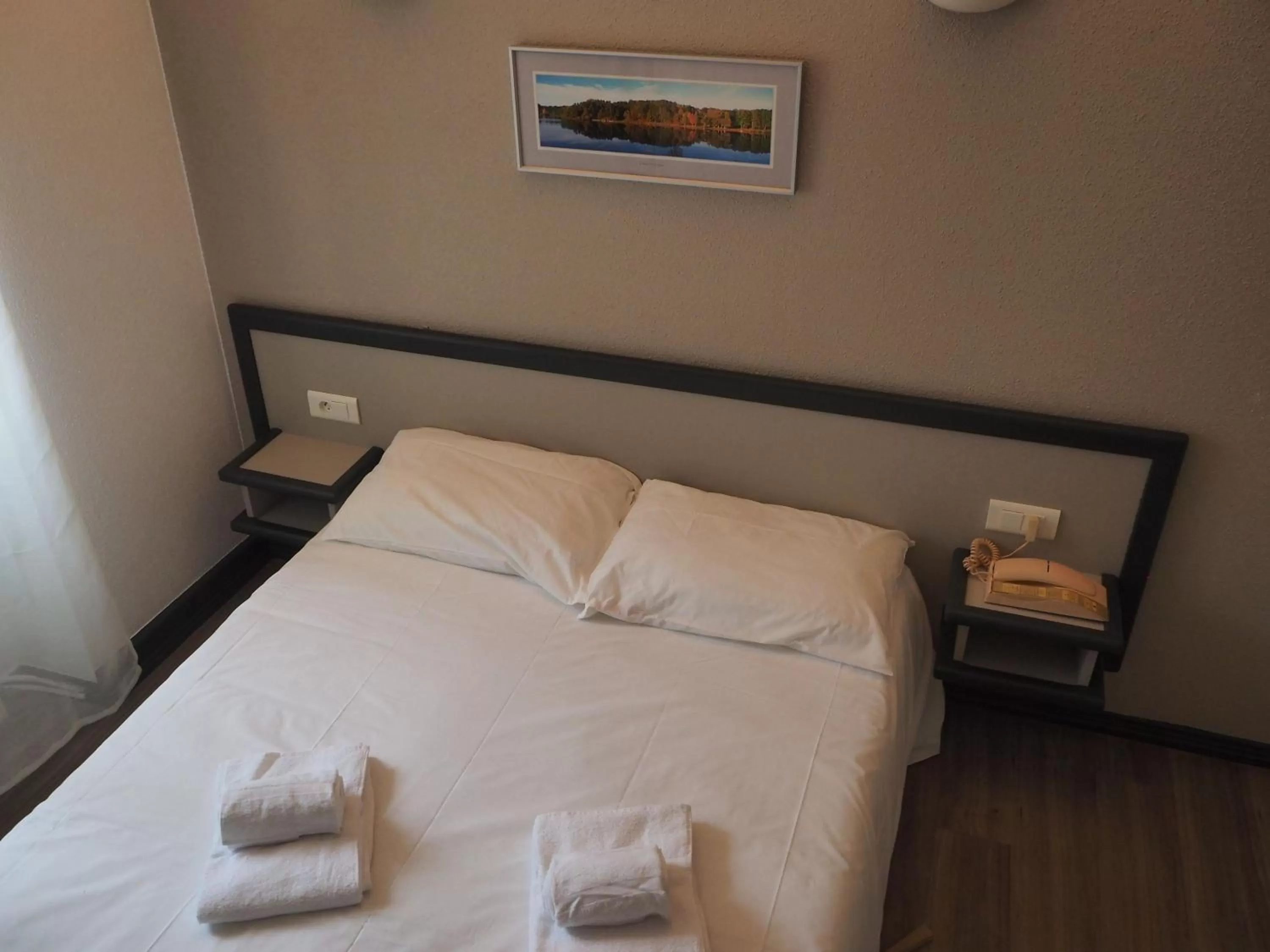 Bed in HOTEL LE FOIRAIL