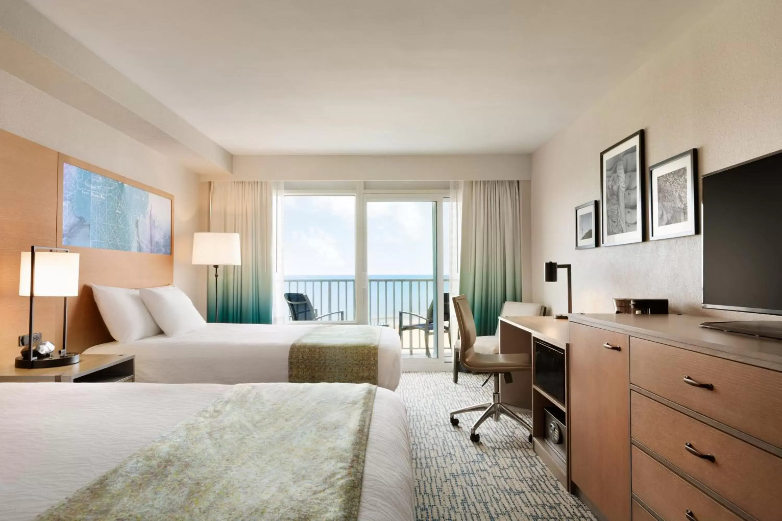 Bedroom in Surfbreak Oceanfront Hotel, Ascend Hotel Collection