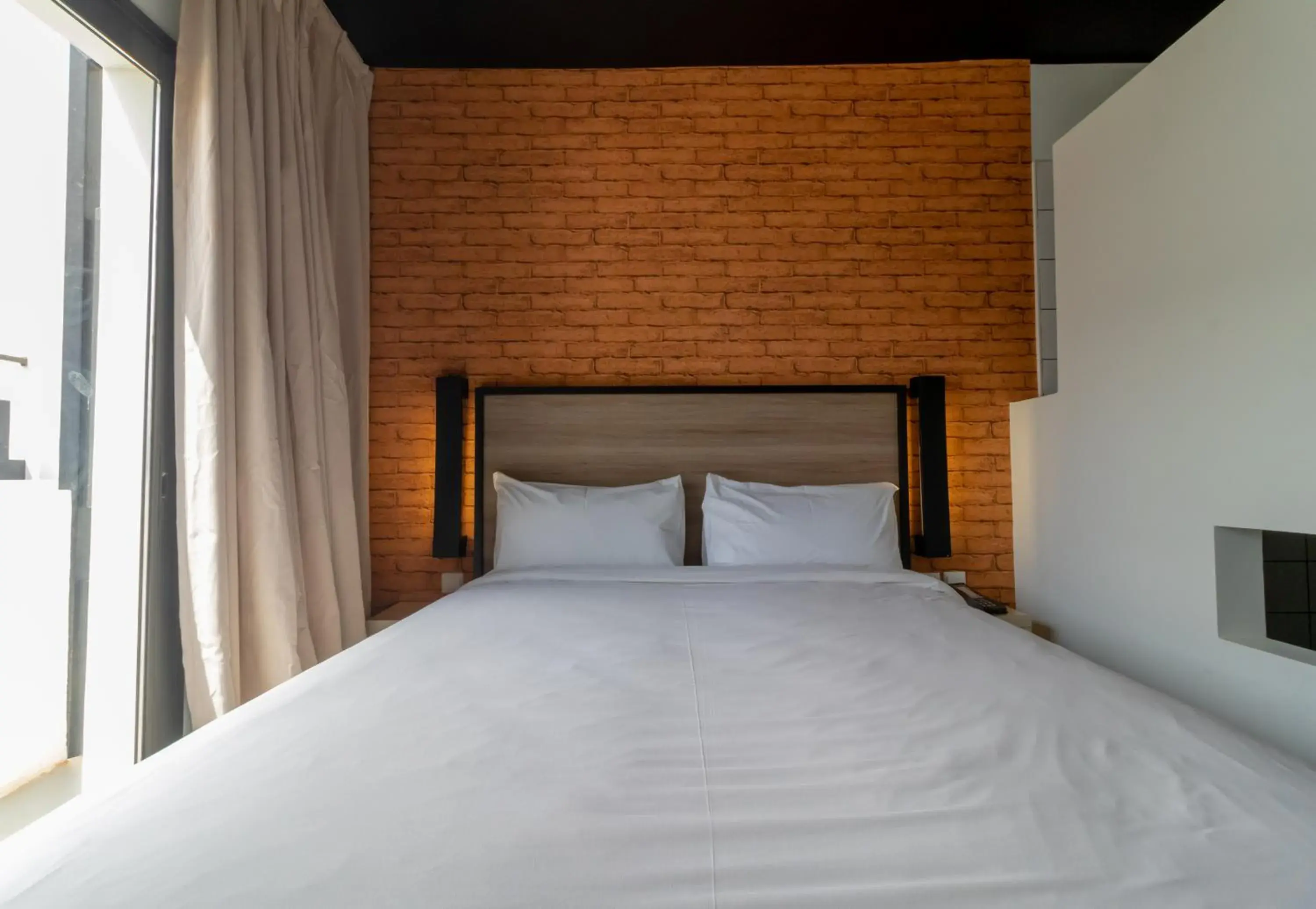 Photo of the whole room, Bed in ONOMO Hotel Dakar