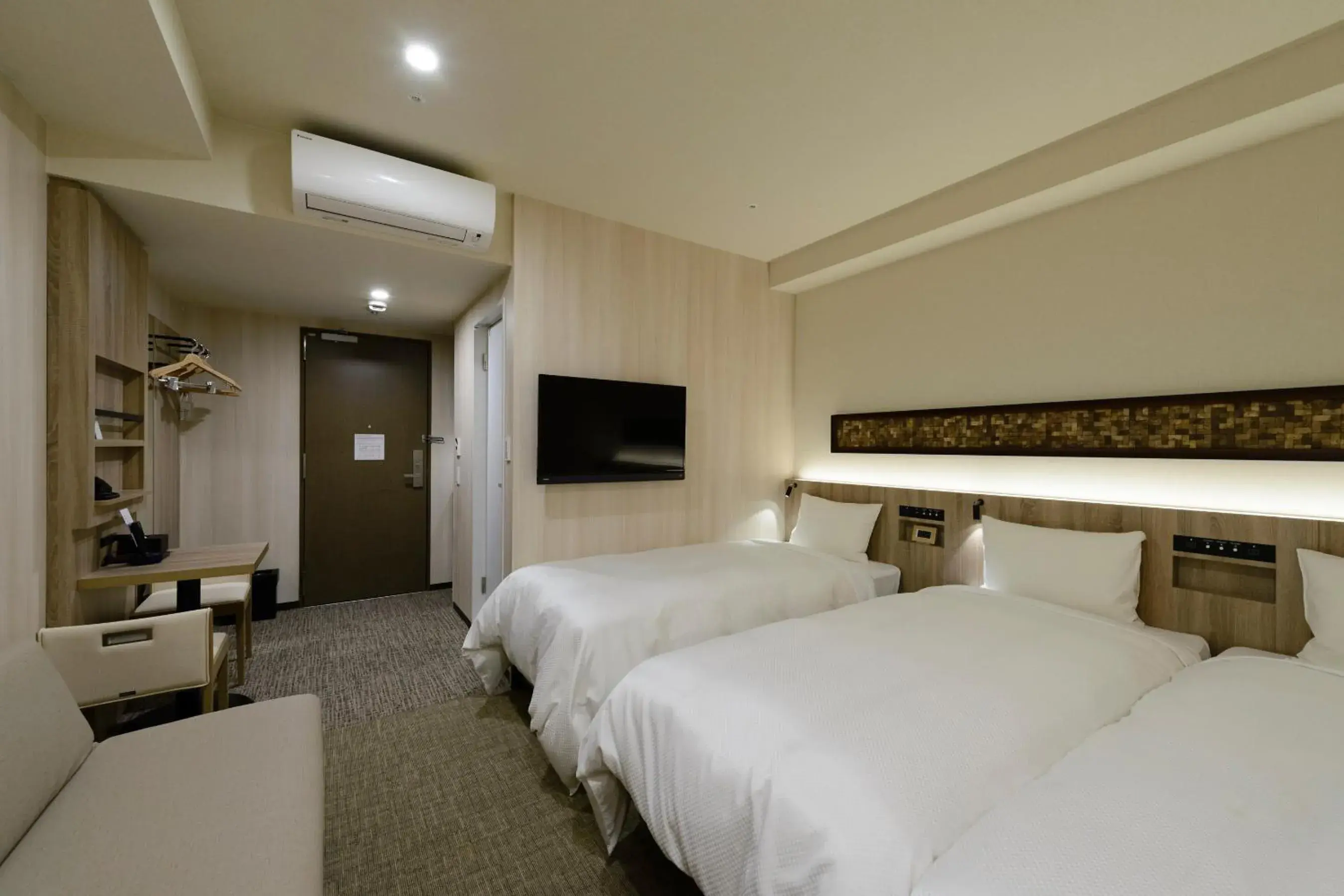 Bed in Hotel Il Fiore Kasai Bed in Hotel Il Fiore Kasai