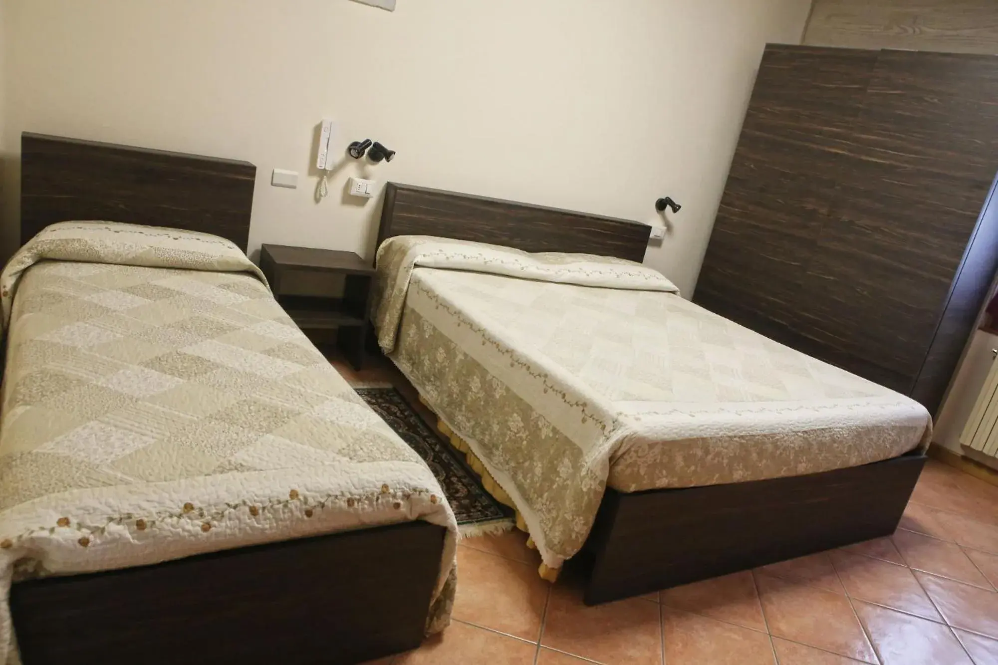 Bed in Albergo Gusmeroli