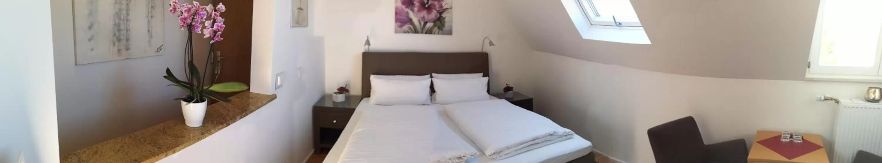 Bed in Tuniberg Restaurant Hotel