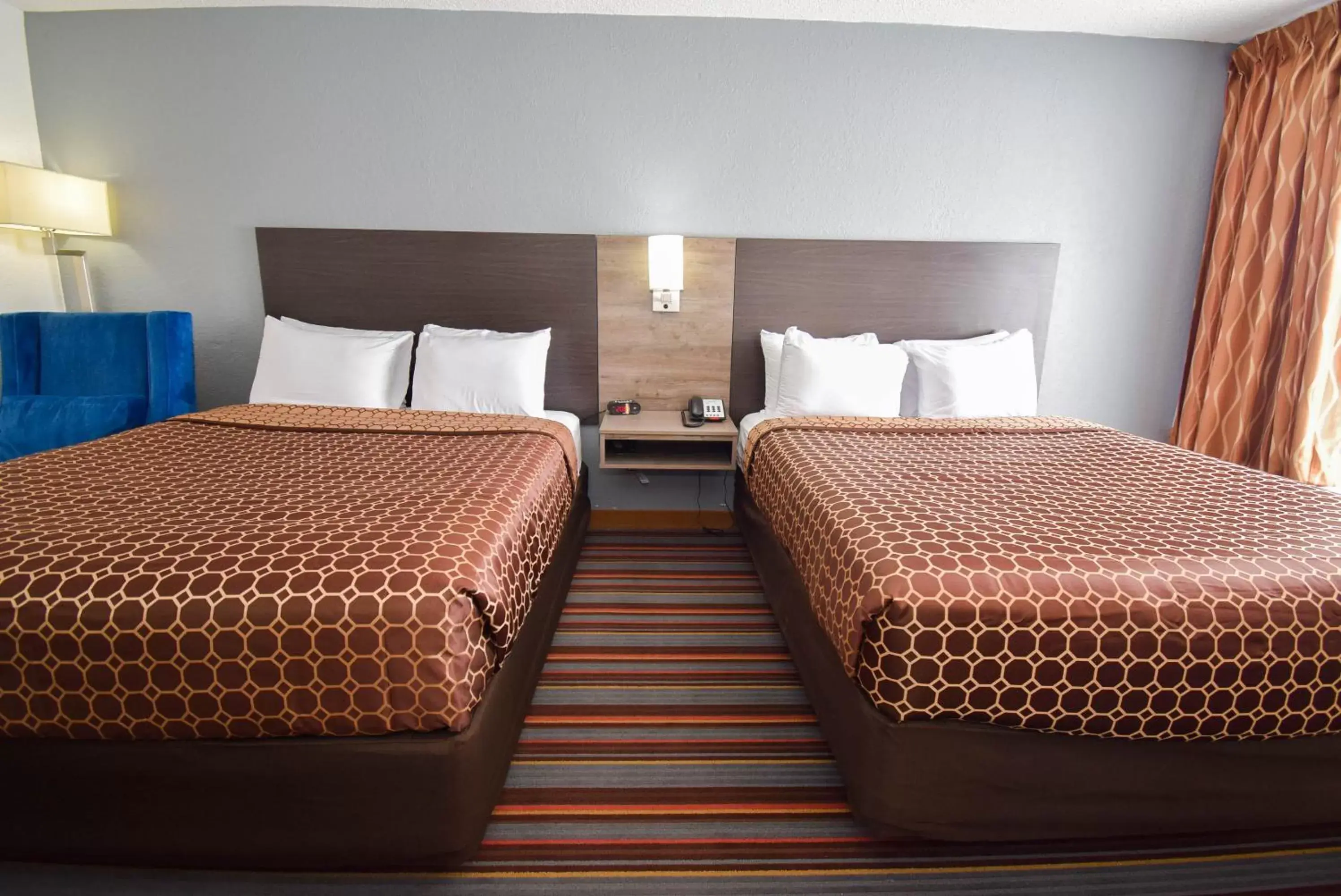 Bed in Quality Inn & Suites Sulphur Springs