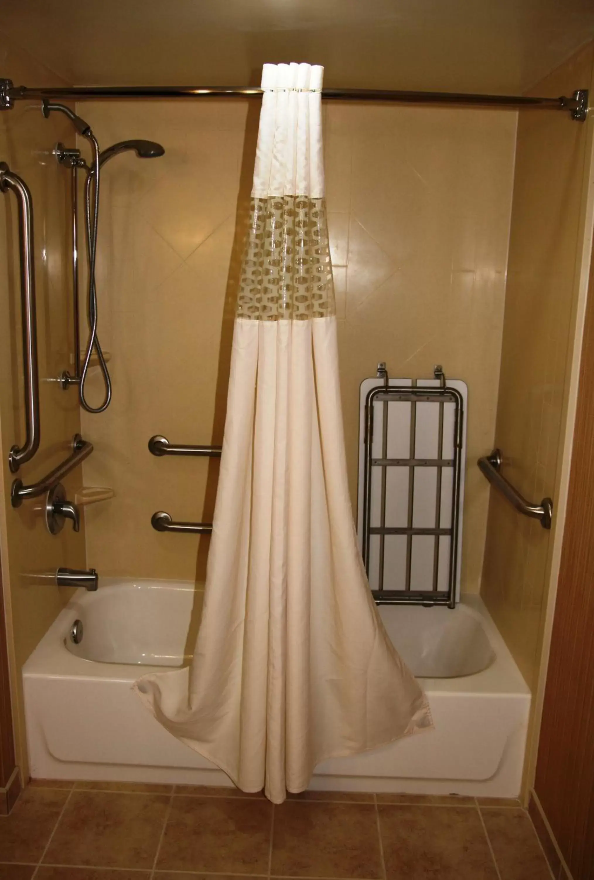 Bathroom in The Addison Hotel SureStay Collection by Best Western