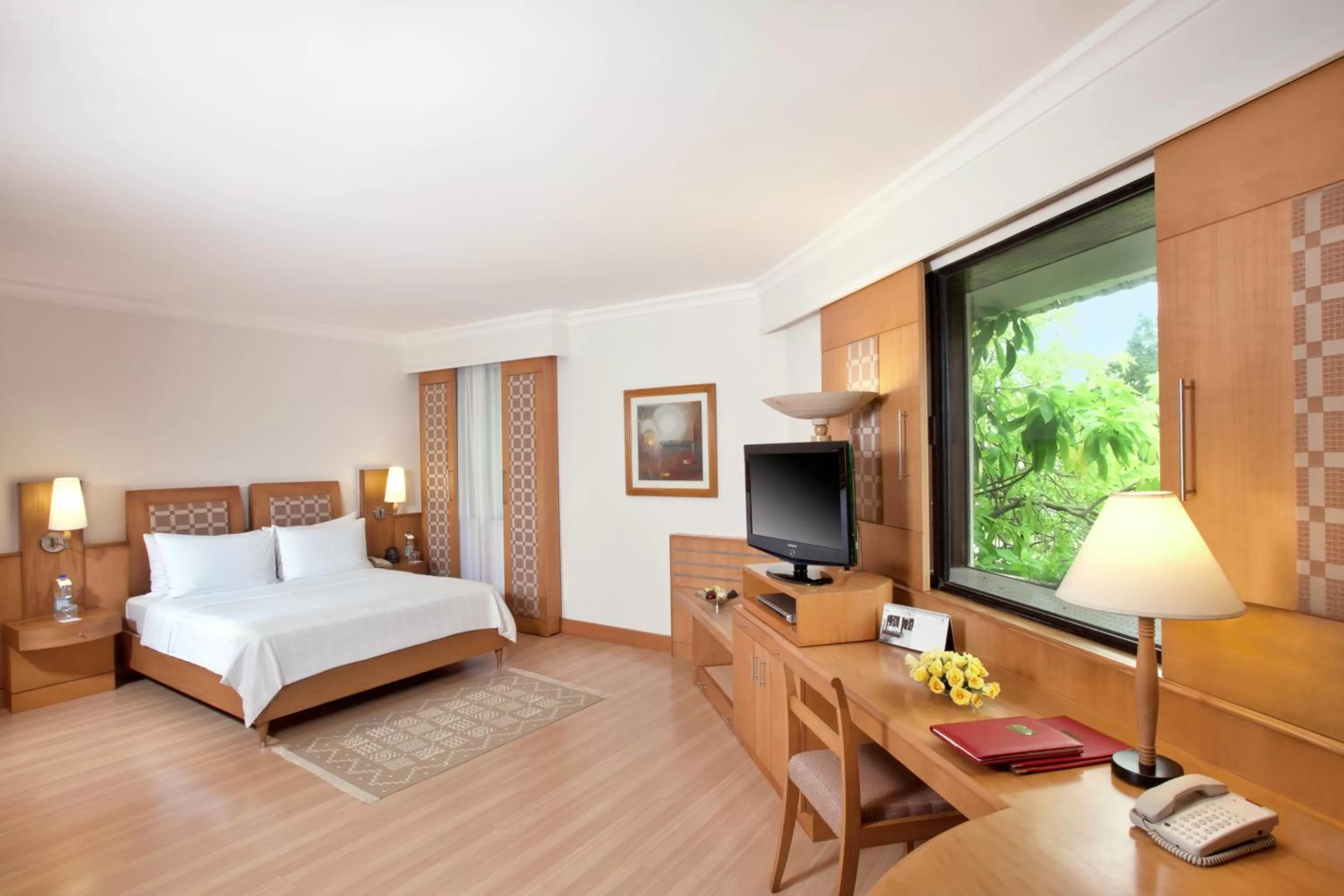 Photo of the whole room, Bed in Trident Chennai