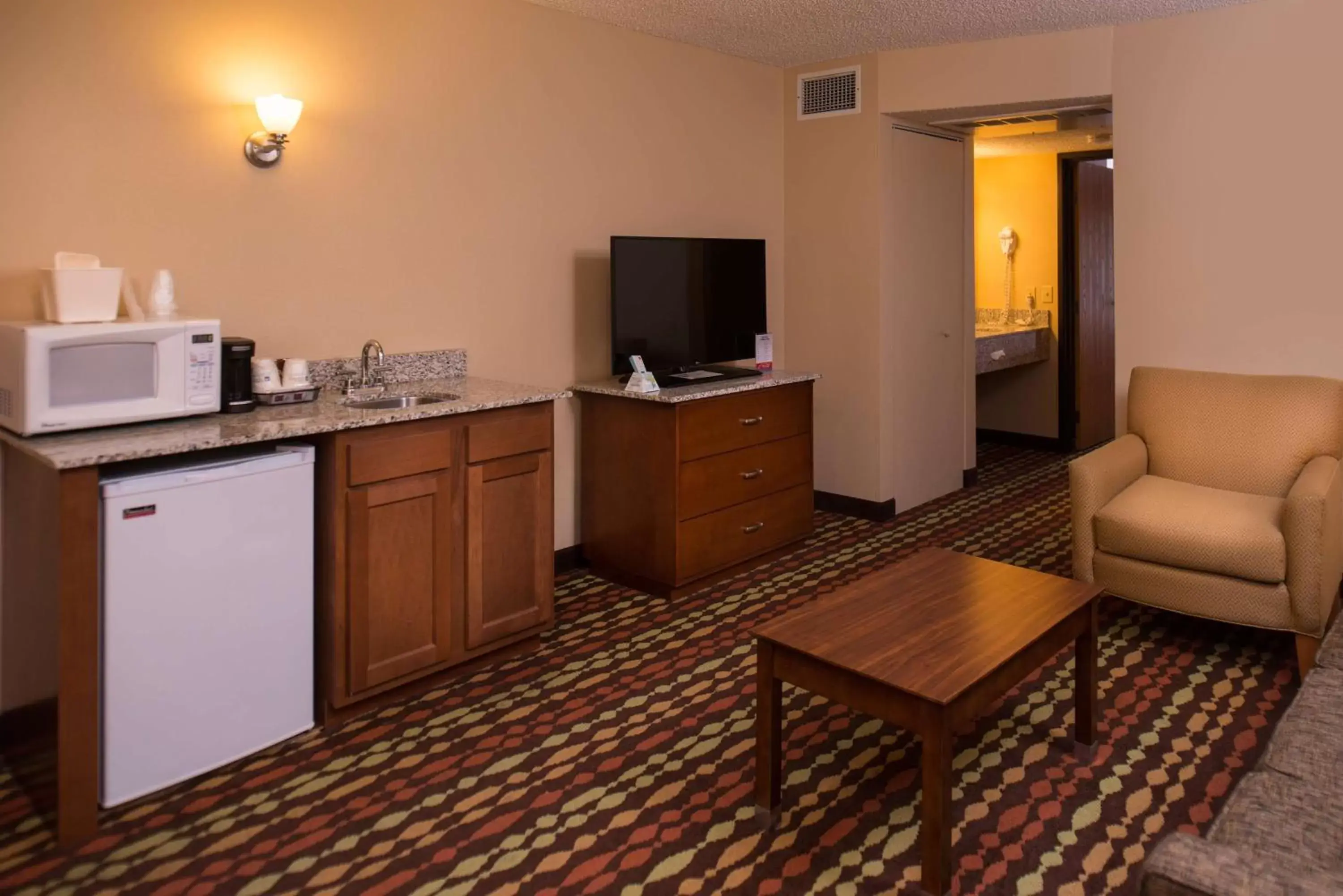 Photo of the whole room, TV/Entertainment Center in Best Western Ambassador Inn & Suites