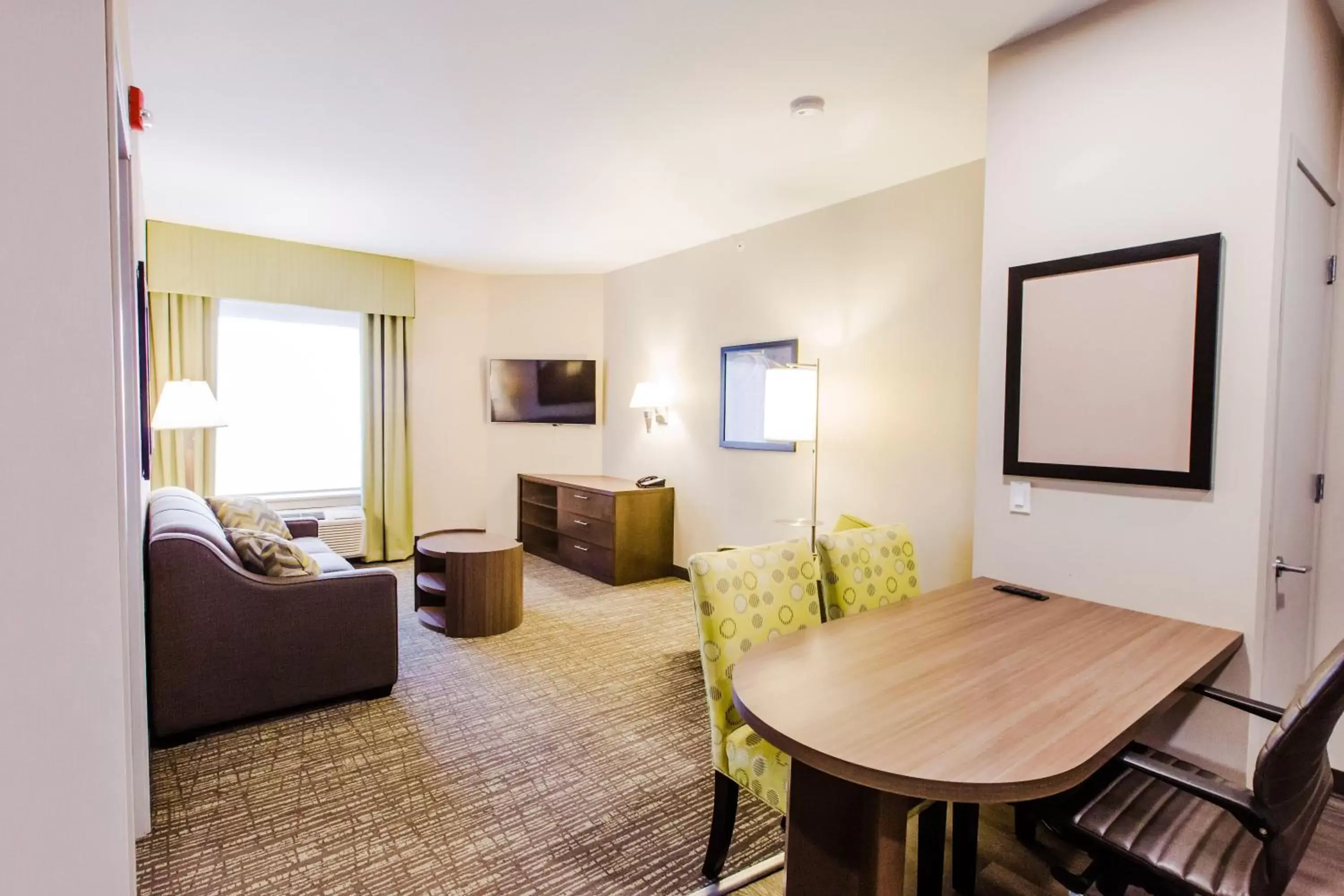 Photo of the whole room, Seating Area in Candlewood Suites West Edmonton - Mall Area, an IHG Hotel