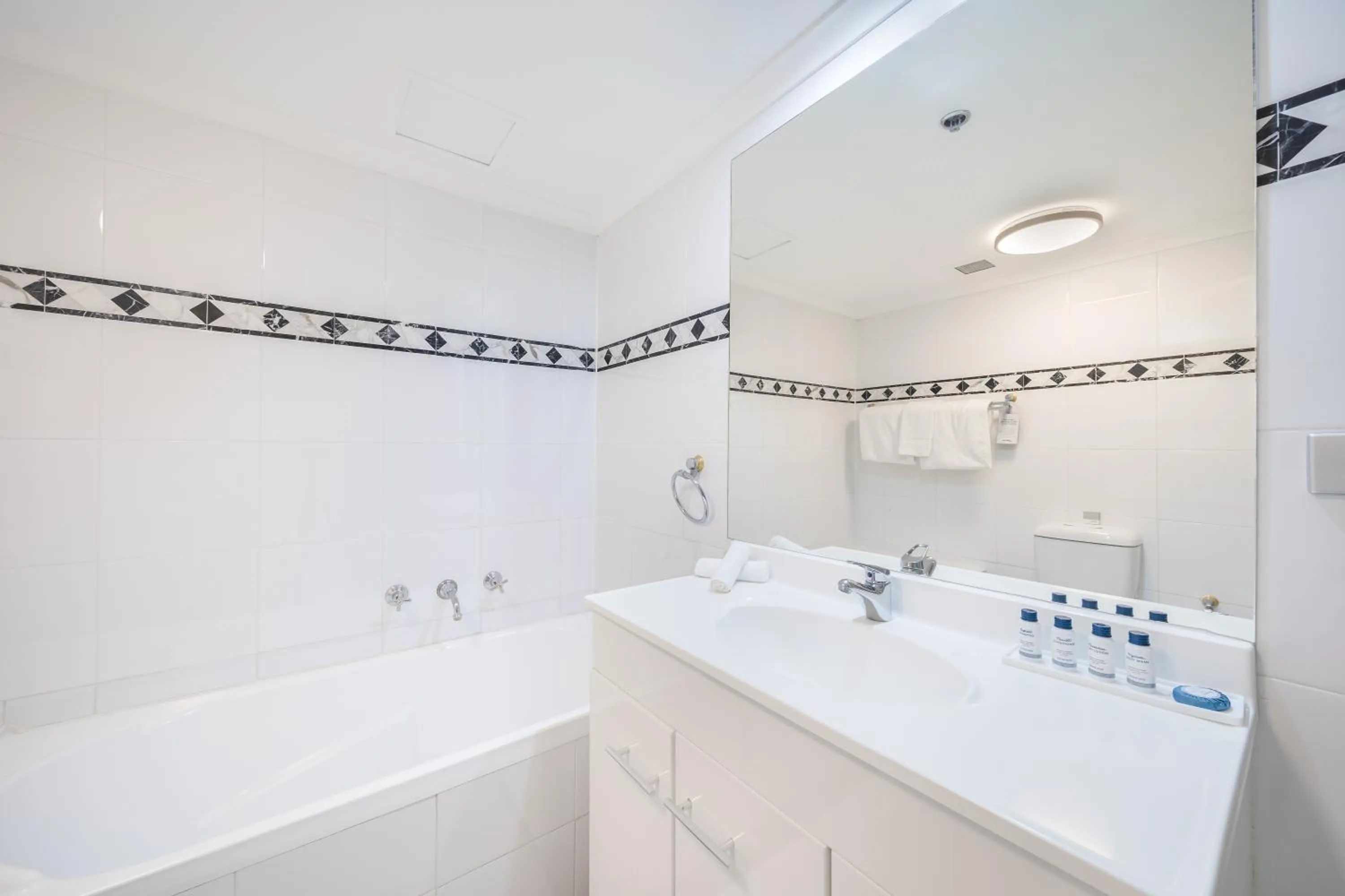 Bathroom in Oaks Sydney Castlereagh Suites