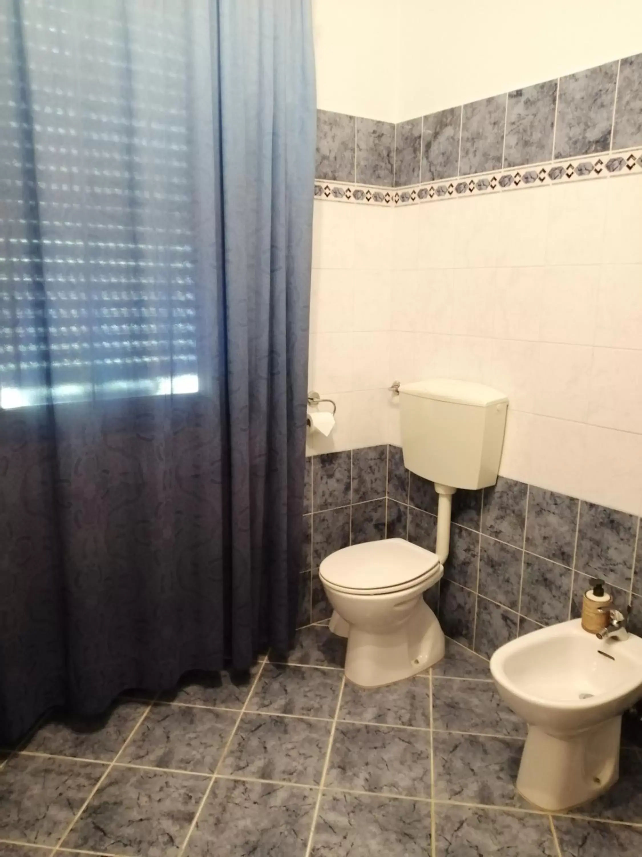 Toilet, Bathroom in Villa Oasi