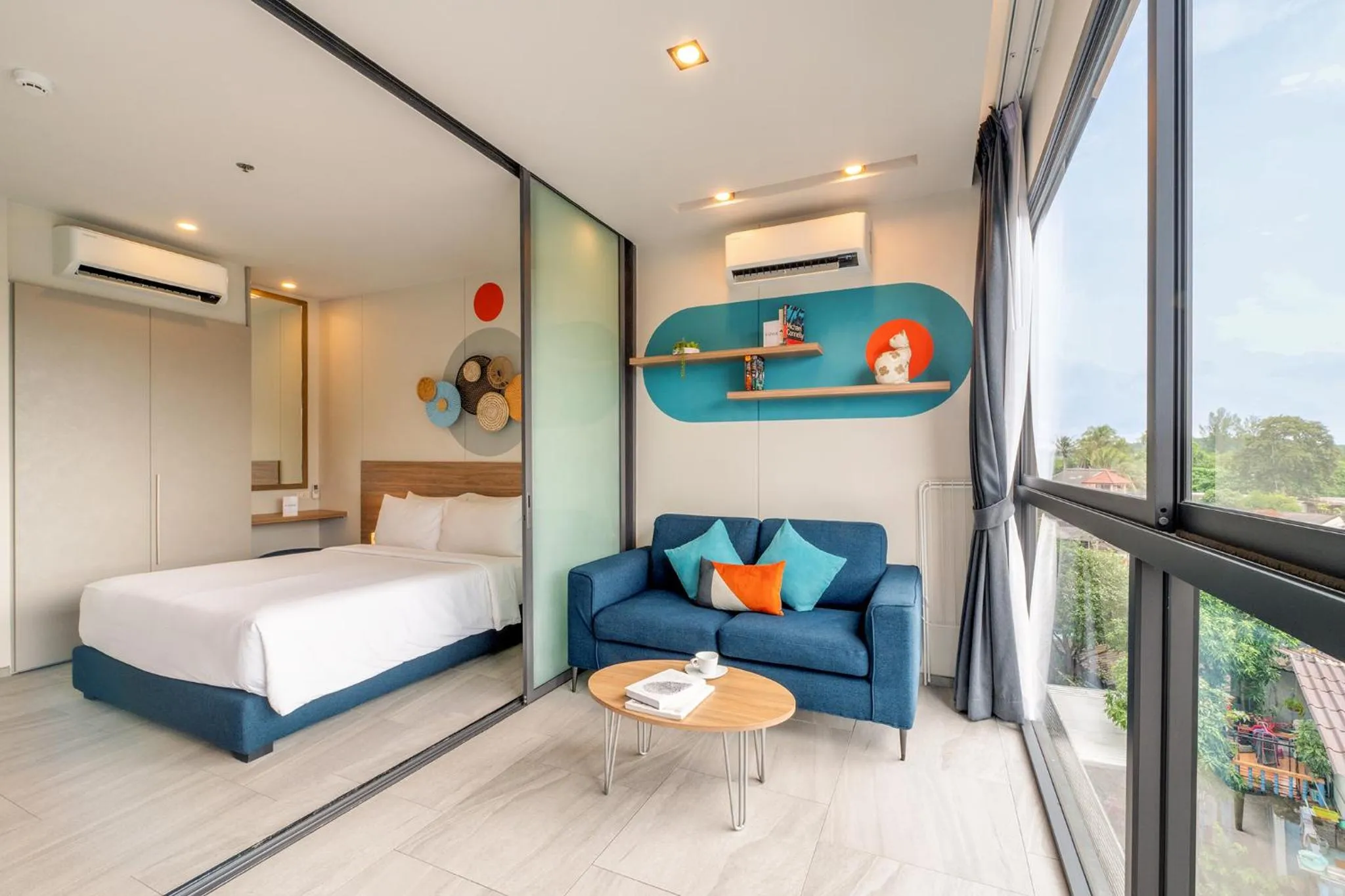 Living room, Bed in HOMA Phuket Town