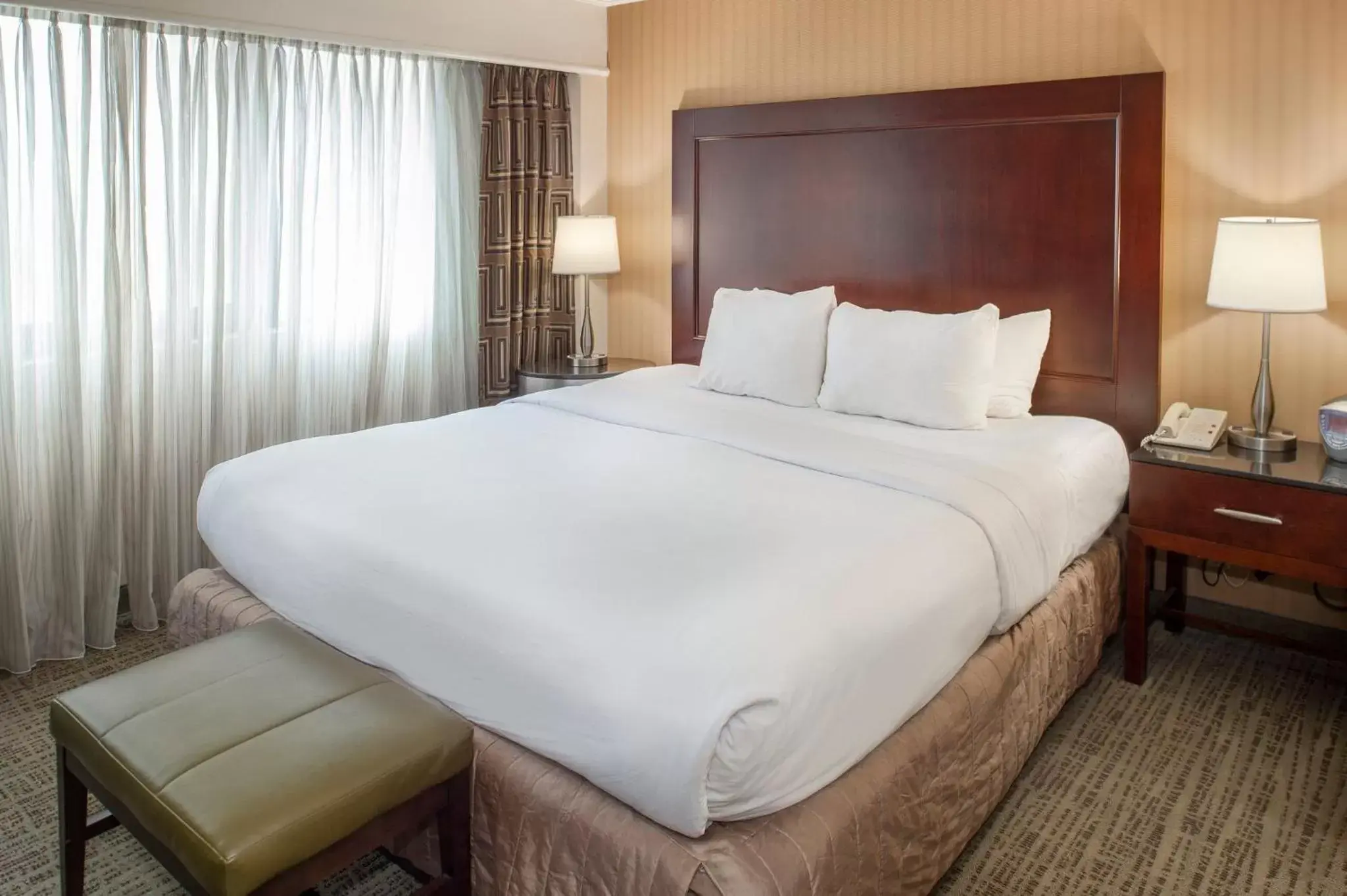 Photo of the whole room, Bed in Crowne Plaza Hotel St. Louis Airport, an IHG Hotel