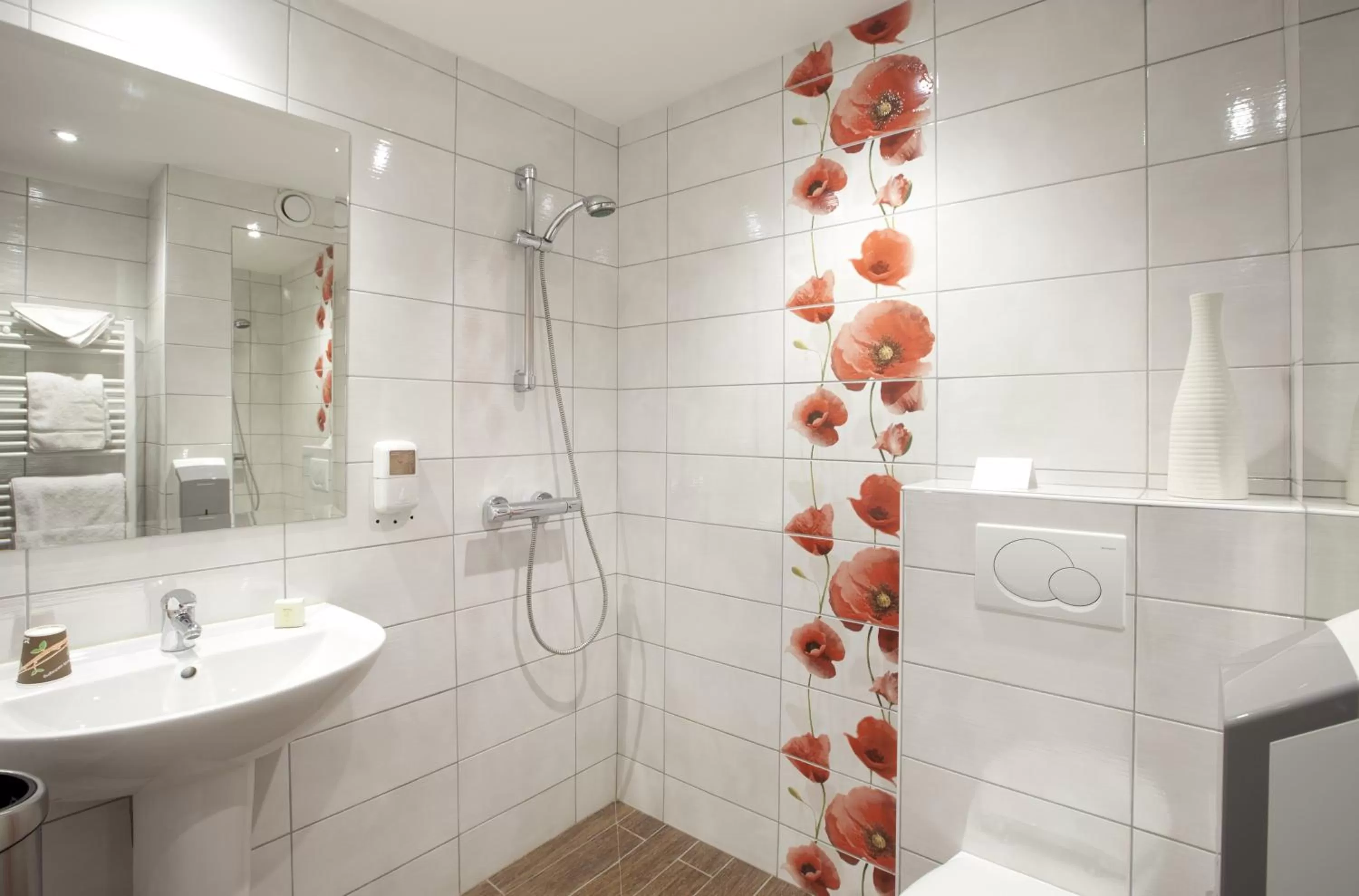 Bathroom in Logis Hôtel Duquesne