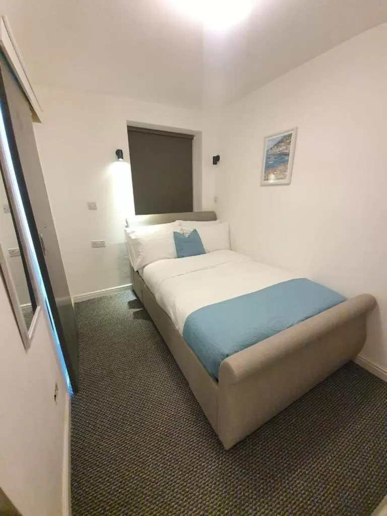 Bed in Alexandra Hotel