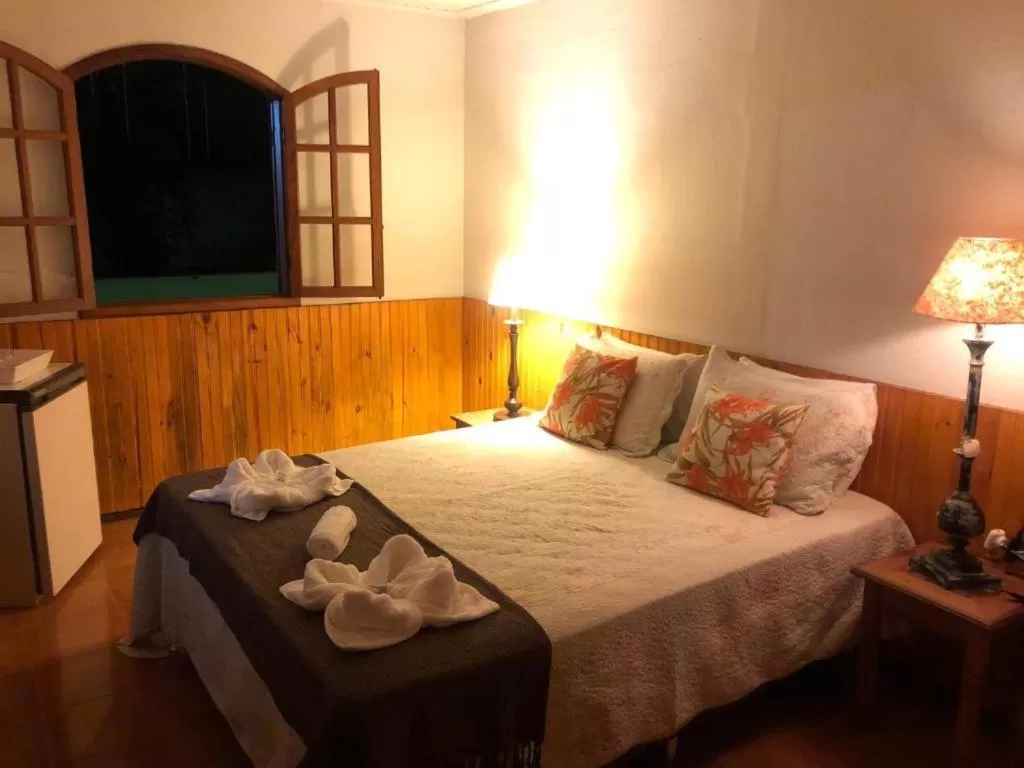 Bed in POUSADA CHARLOTTE