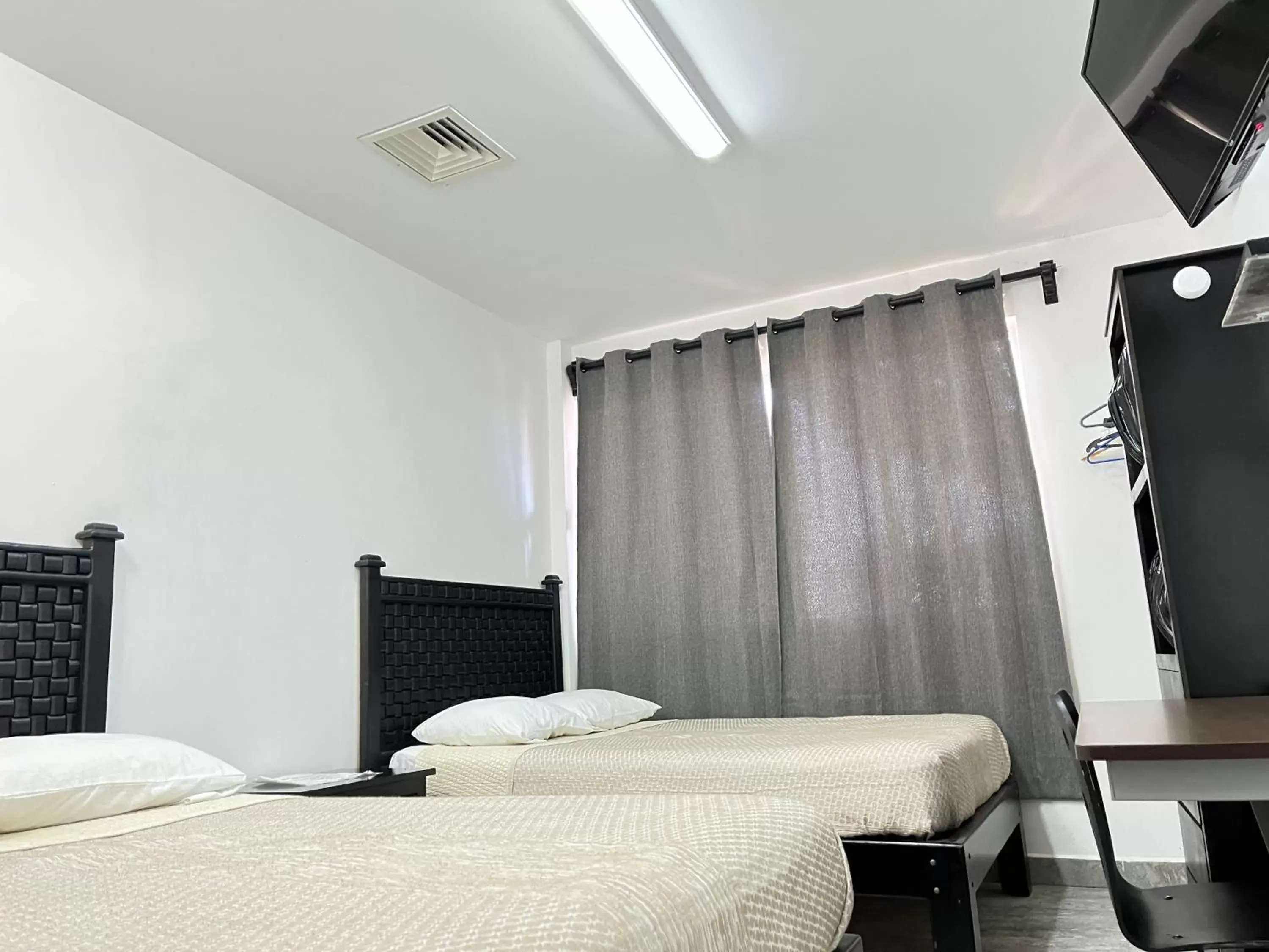 Bed in Genesis Suites / Lofts