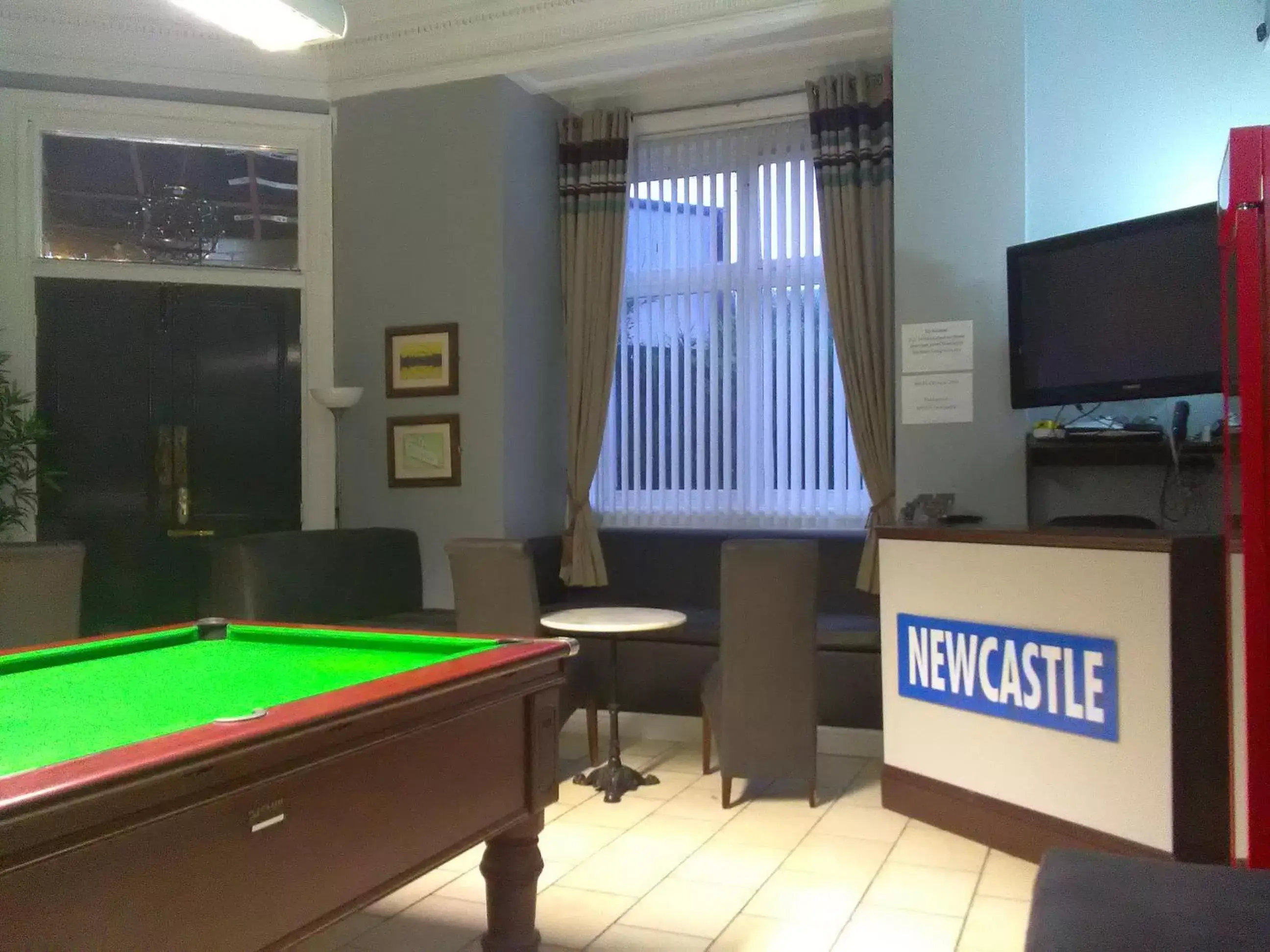 Communal lounge/ TV room, Billiards in Newcastle West Hotel & Bar