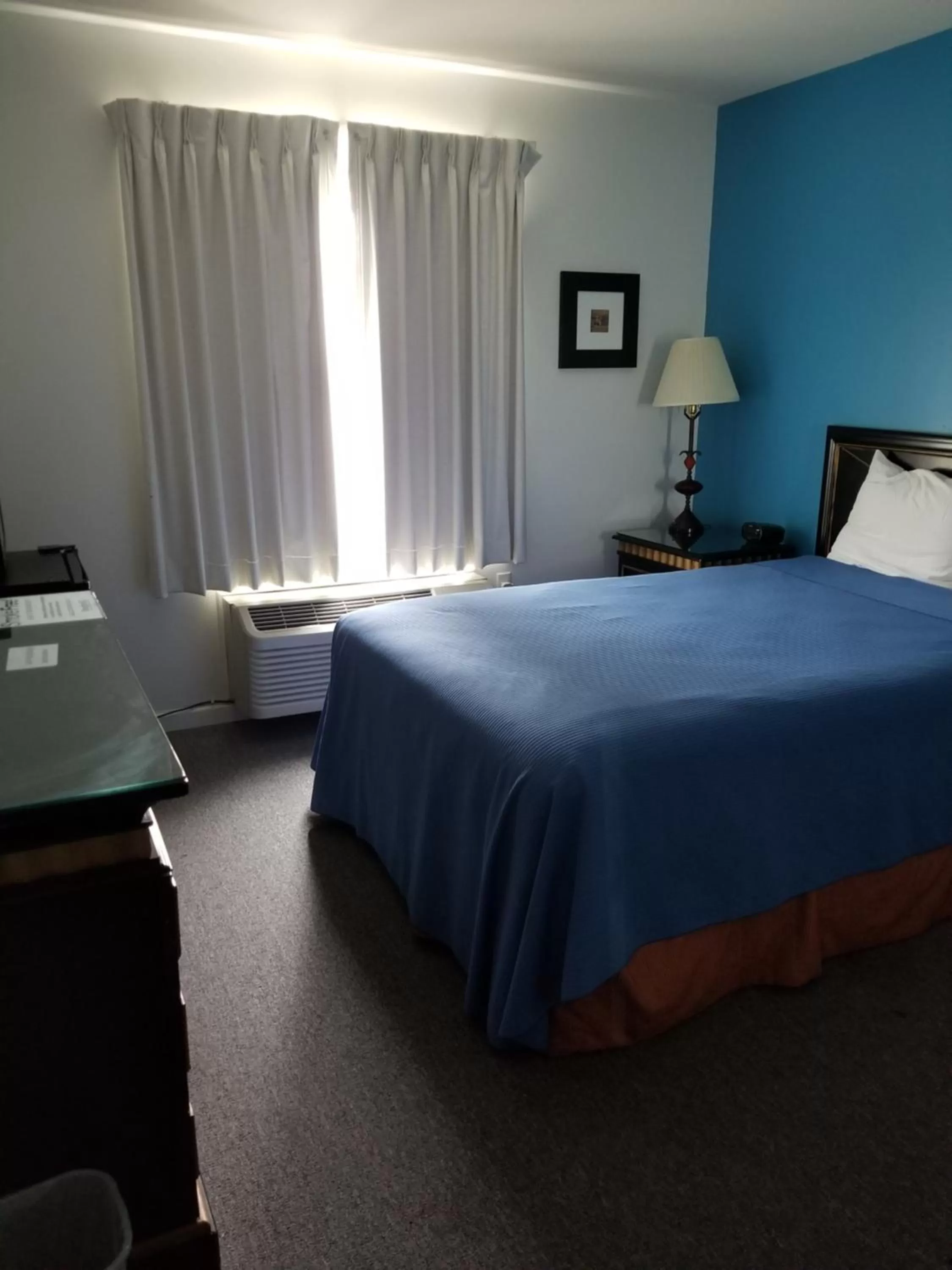 Bedroom, Bed in Ramada by Wyndham Williston