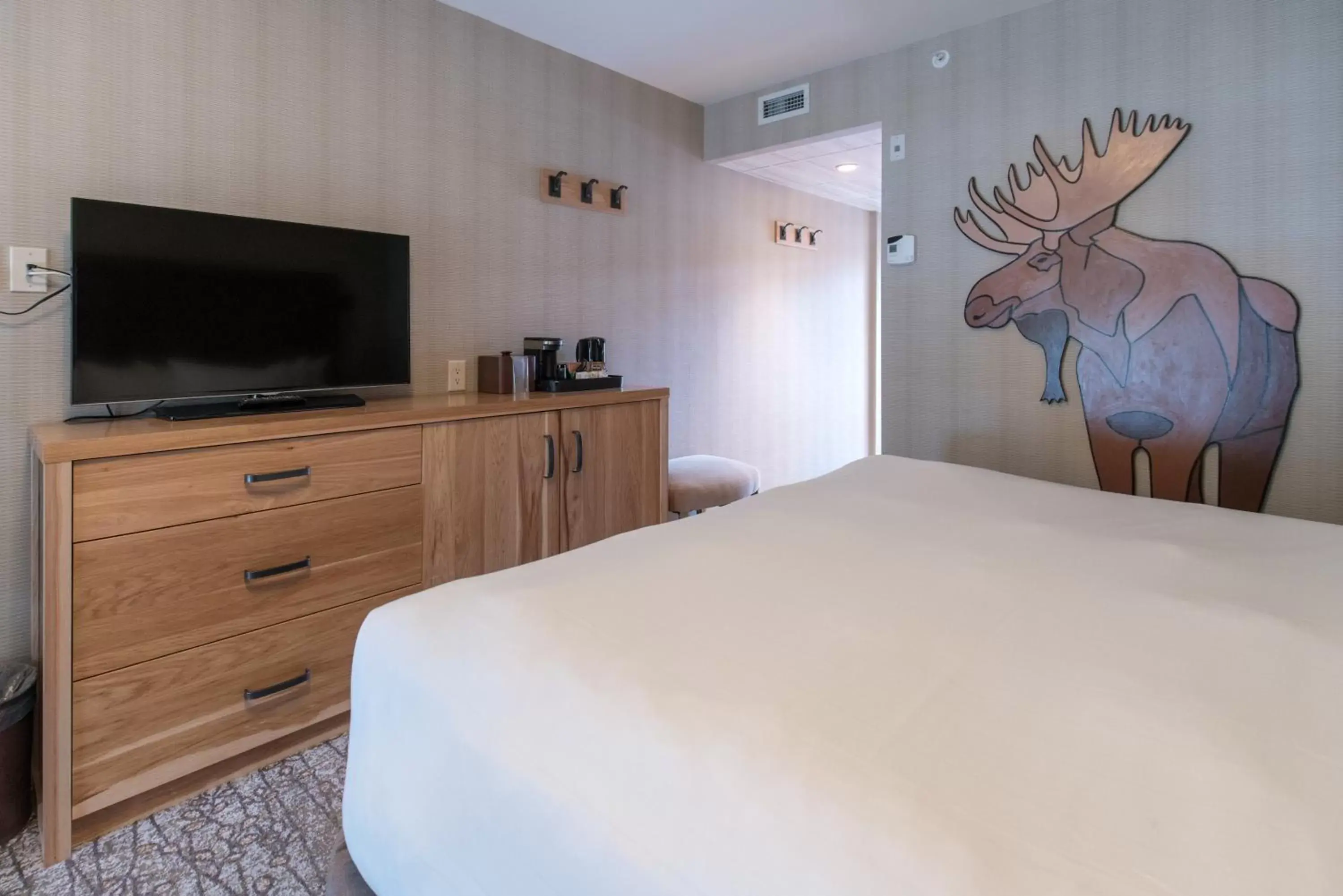 Bedroom in Moose Hotel and Suites
