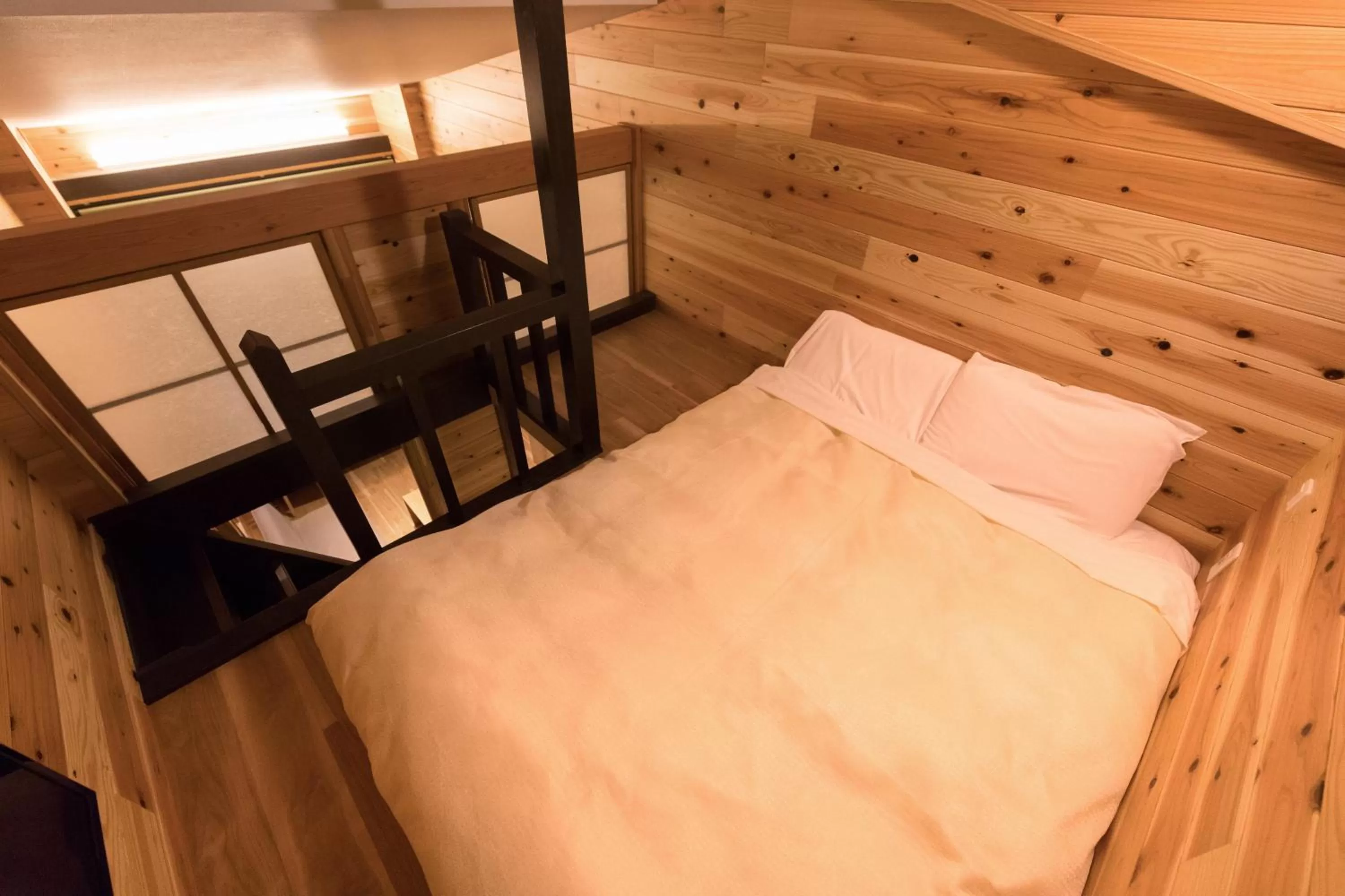 Bed in Hotel Miyajima Villa