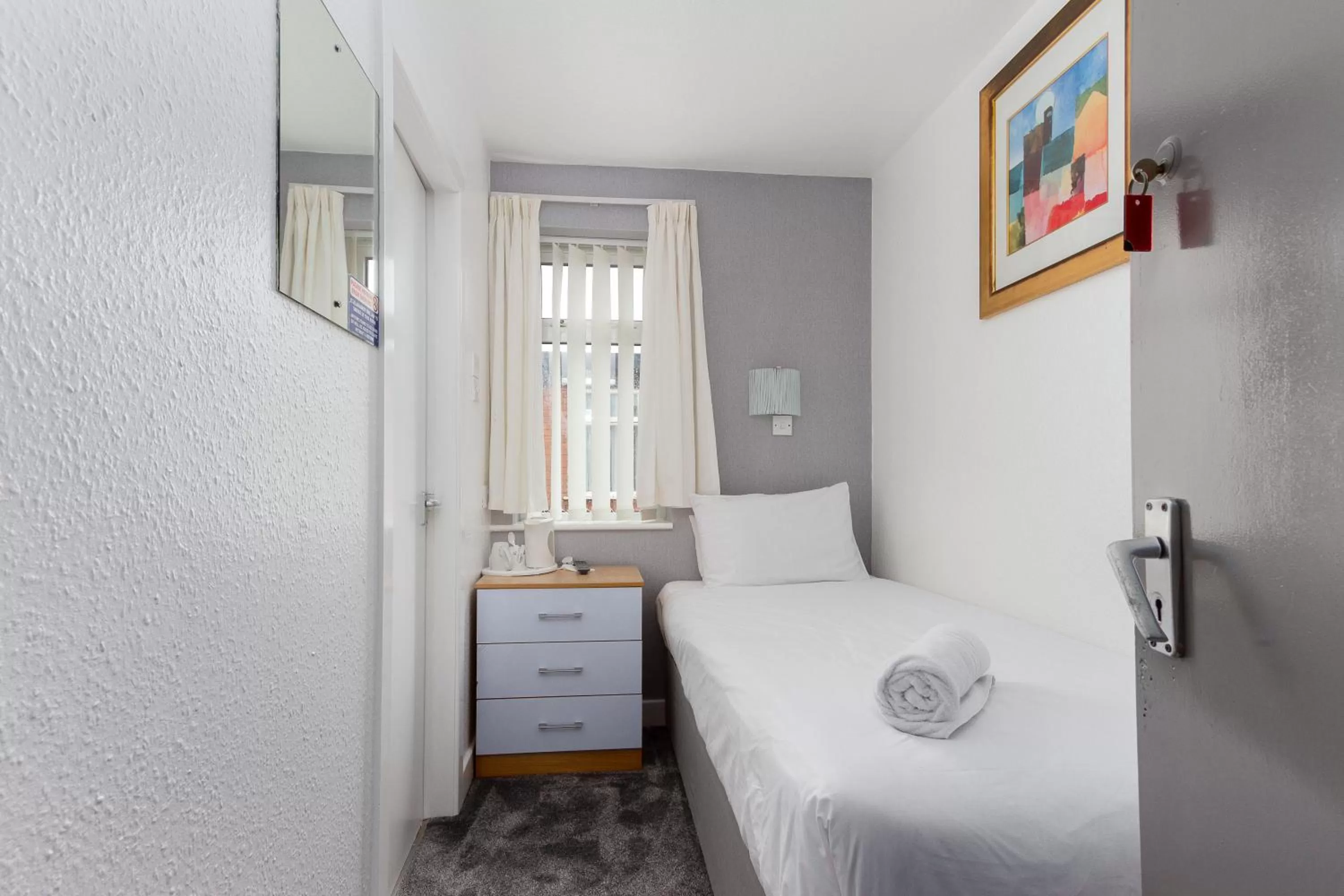 Bedroom, Bed in The Sandringham Court Hotel & Apartment Welcoming Large and Small Groups for 15 years