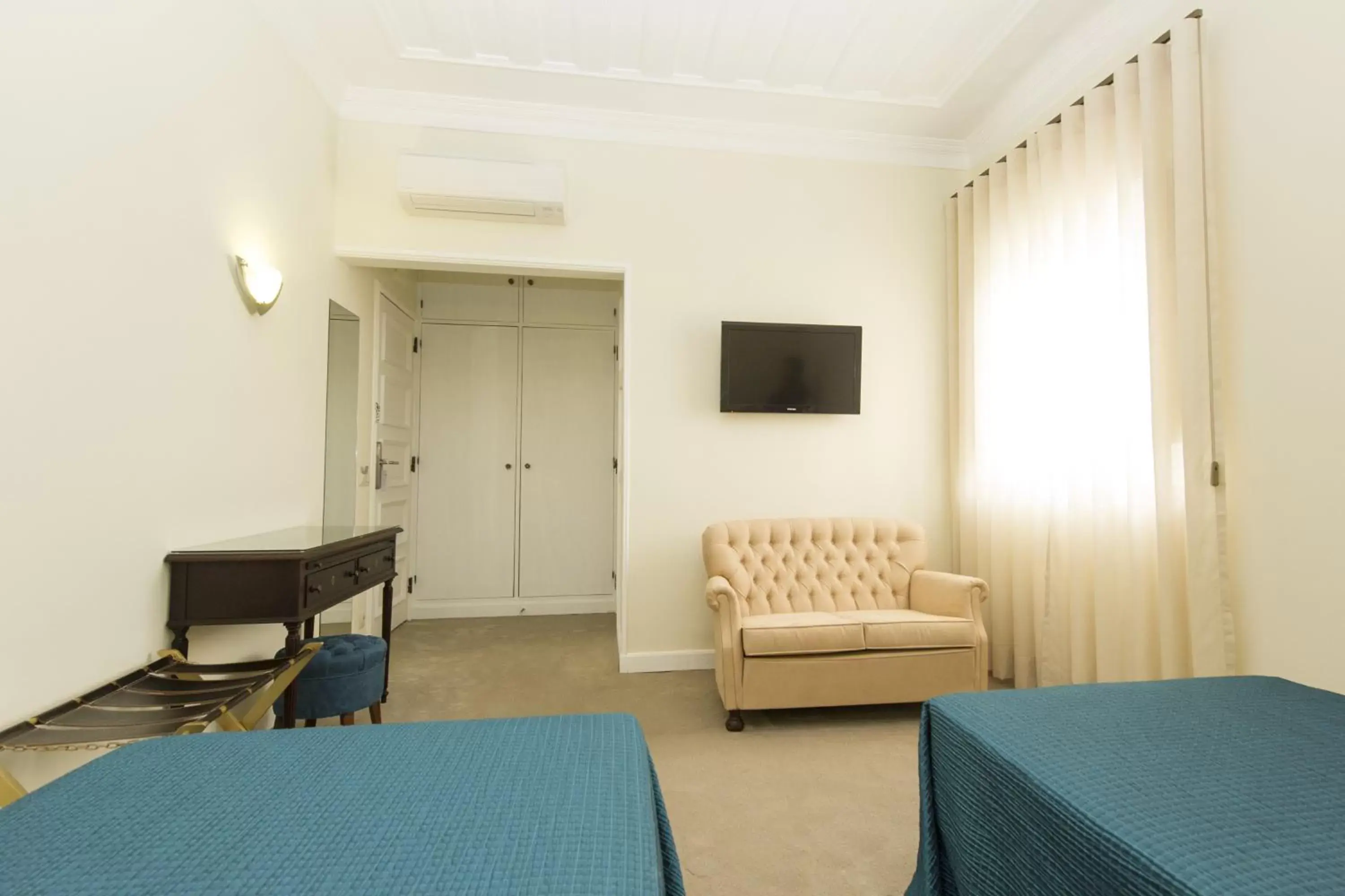 Bedroom, Seating Area in Hotel Joao Padeiro