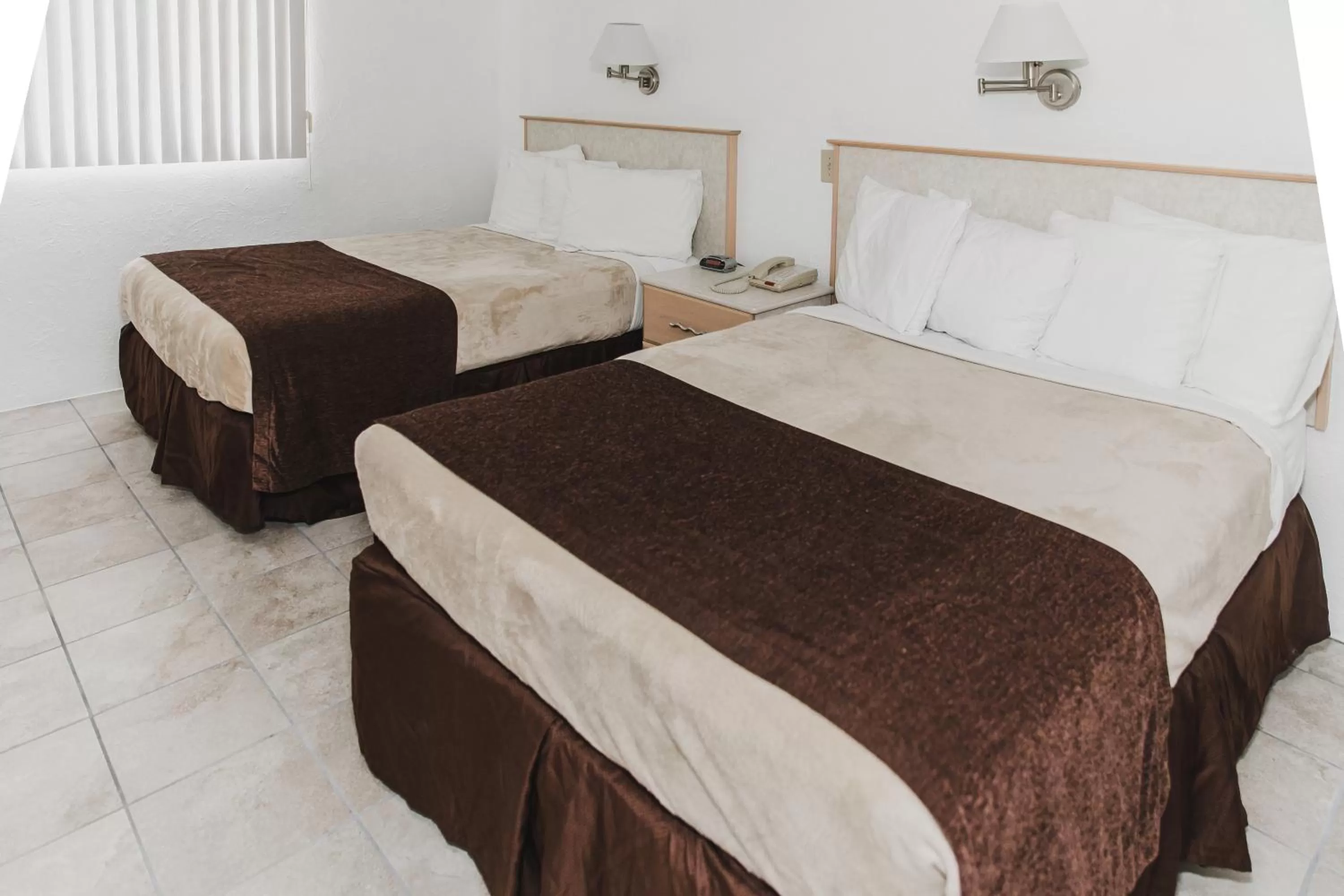 Bed in Heart of Wildwood Boardwalk Motel