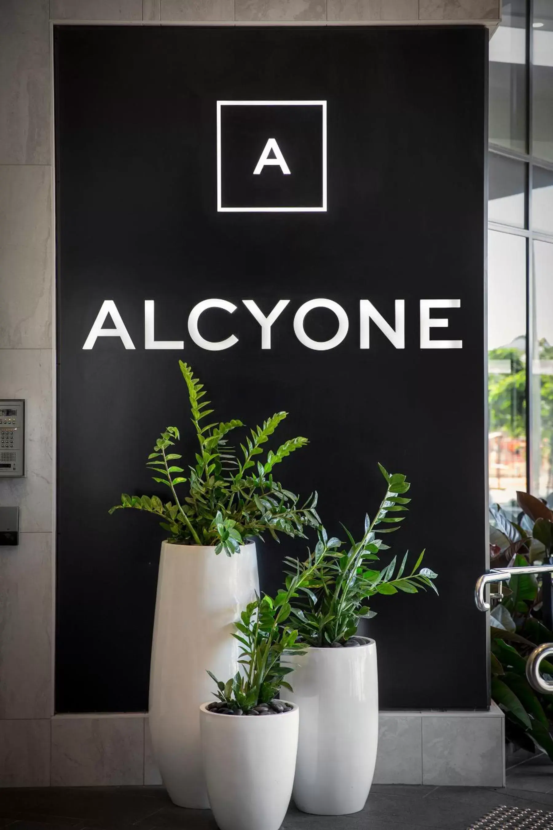Property logo or sign in Alcyone Hotel Residences