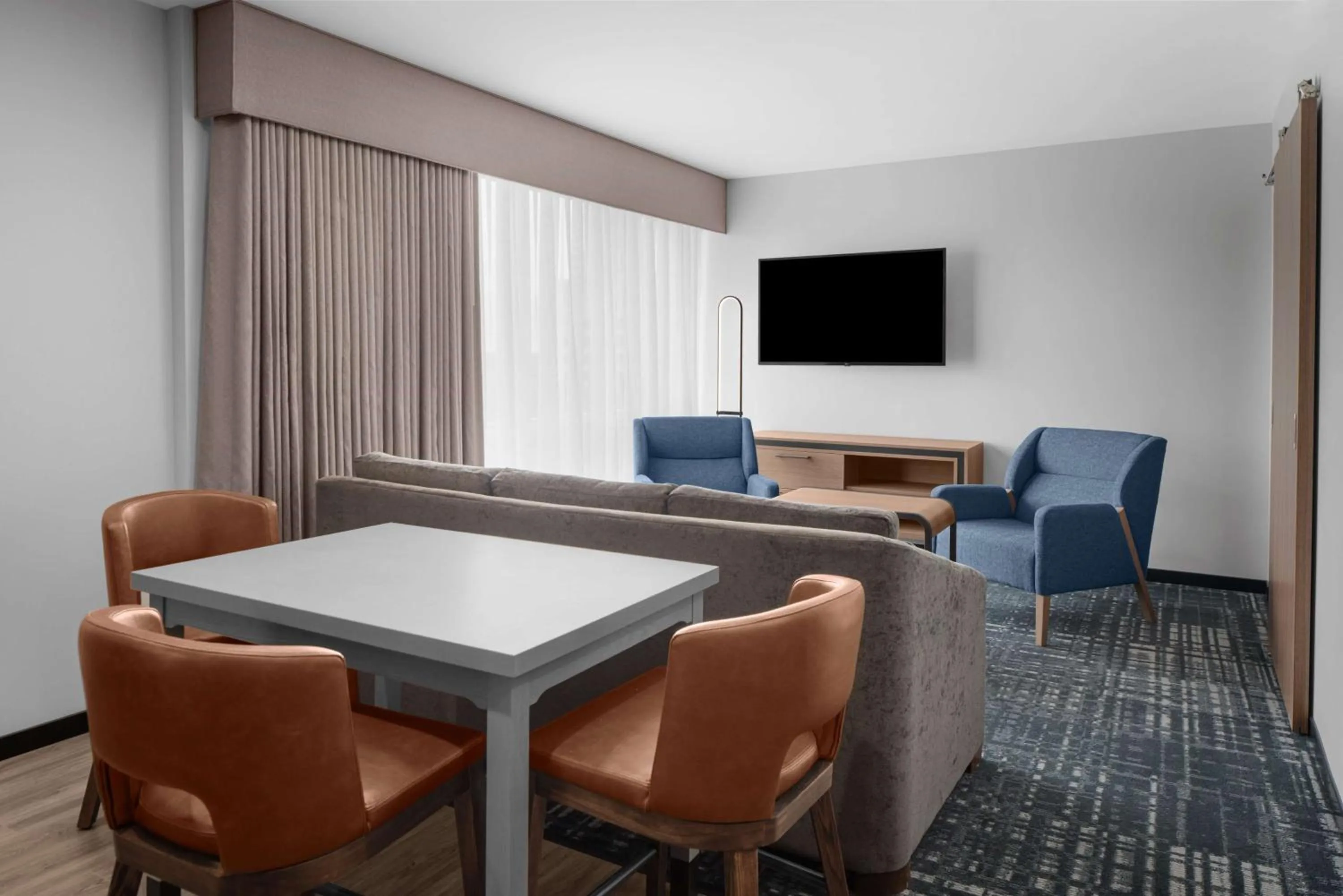 Living room in Homewood Suites By Hilton Charlotte Uptown First Ward