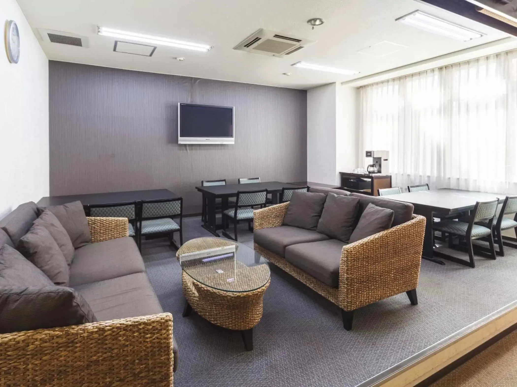 Communal lounge/ TV room, Seating Area in Hotel Minatoya