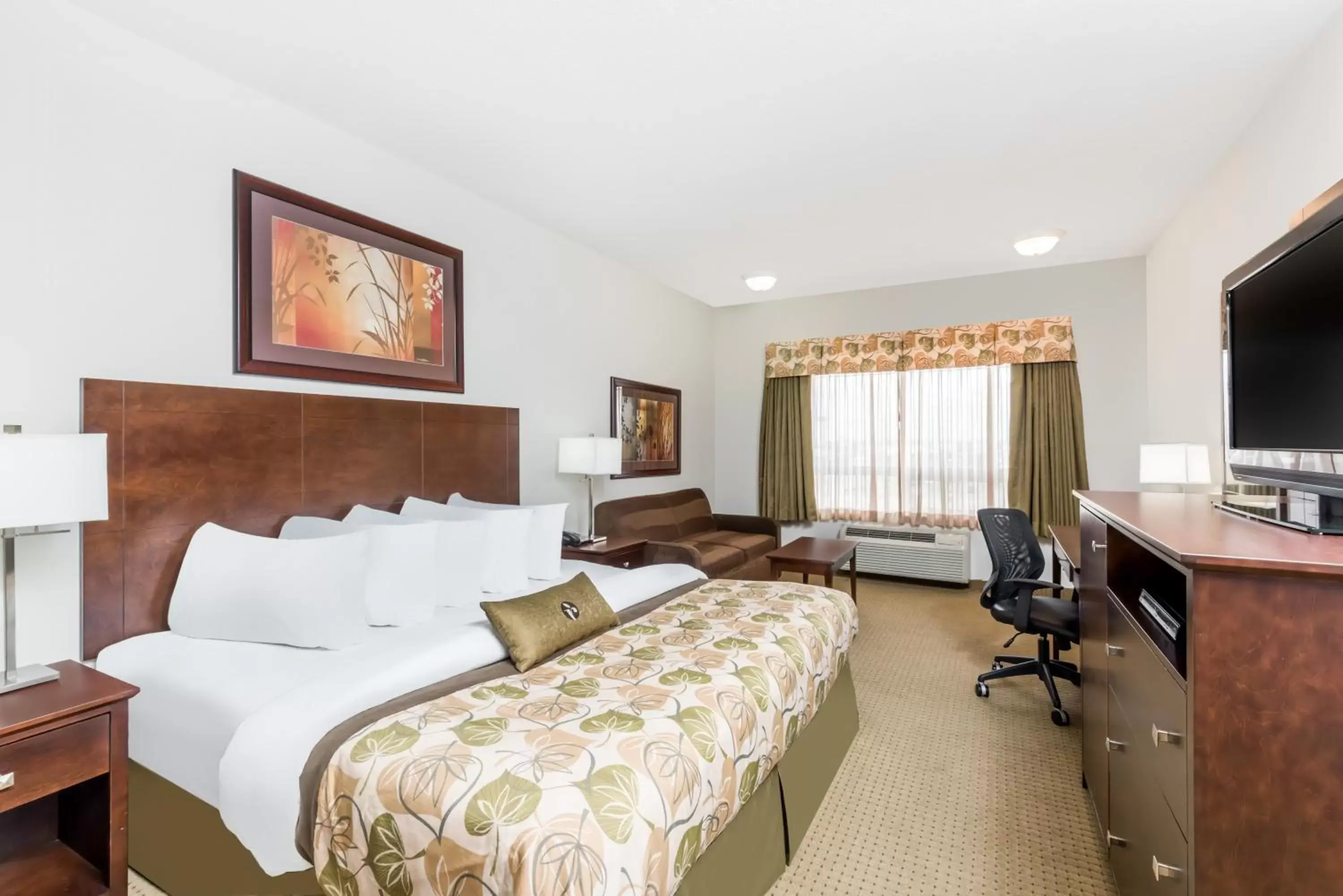 Bed, Room Photo in Ramada by Wyndham Olds