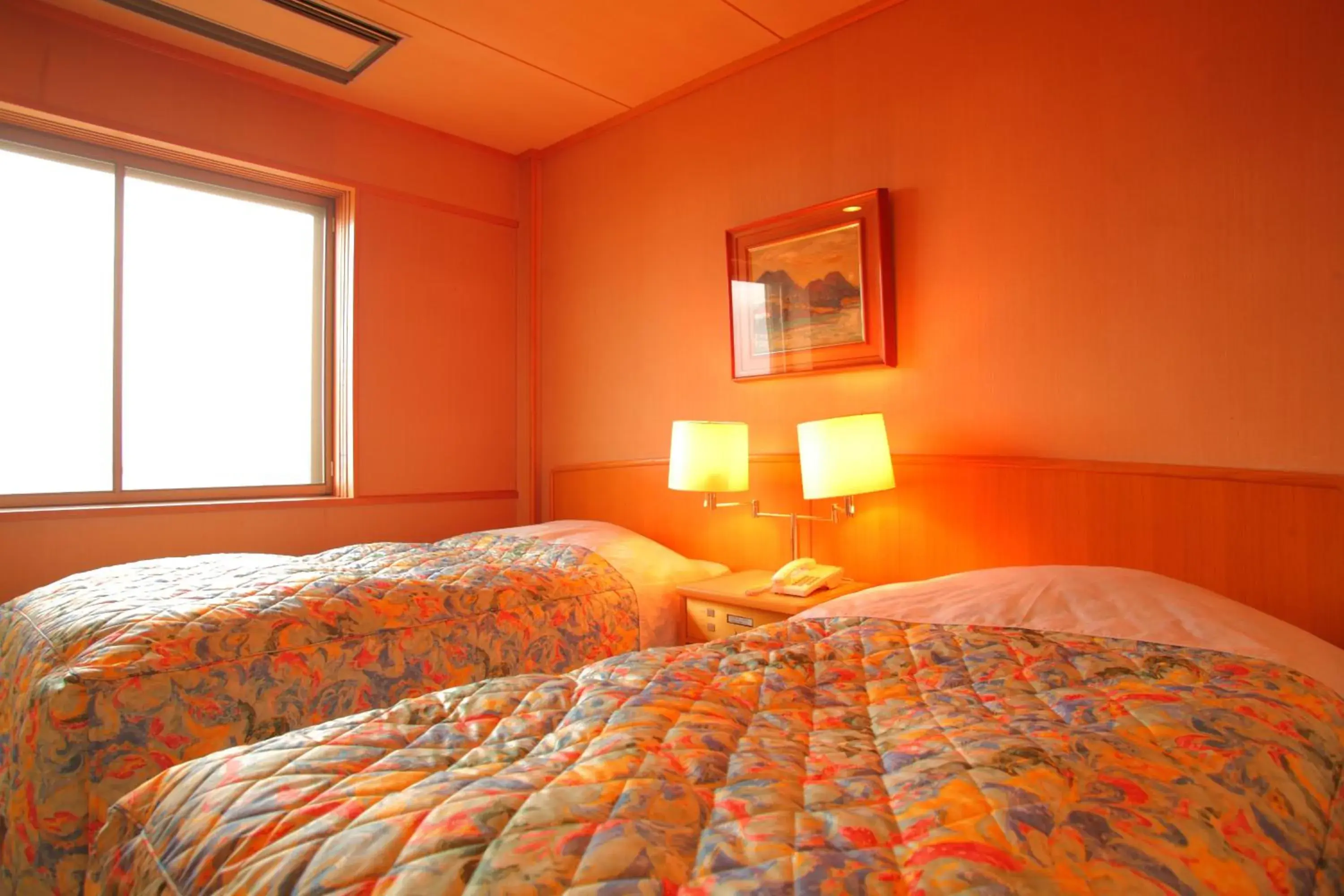 Photo of the whole room, Bed in Himi Onsenkyo Eihokaku