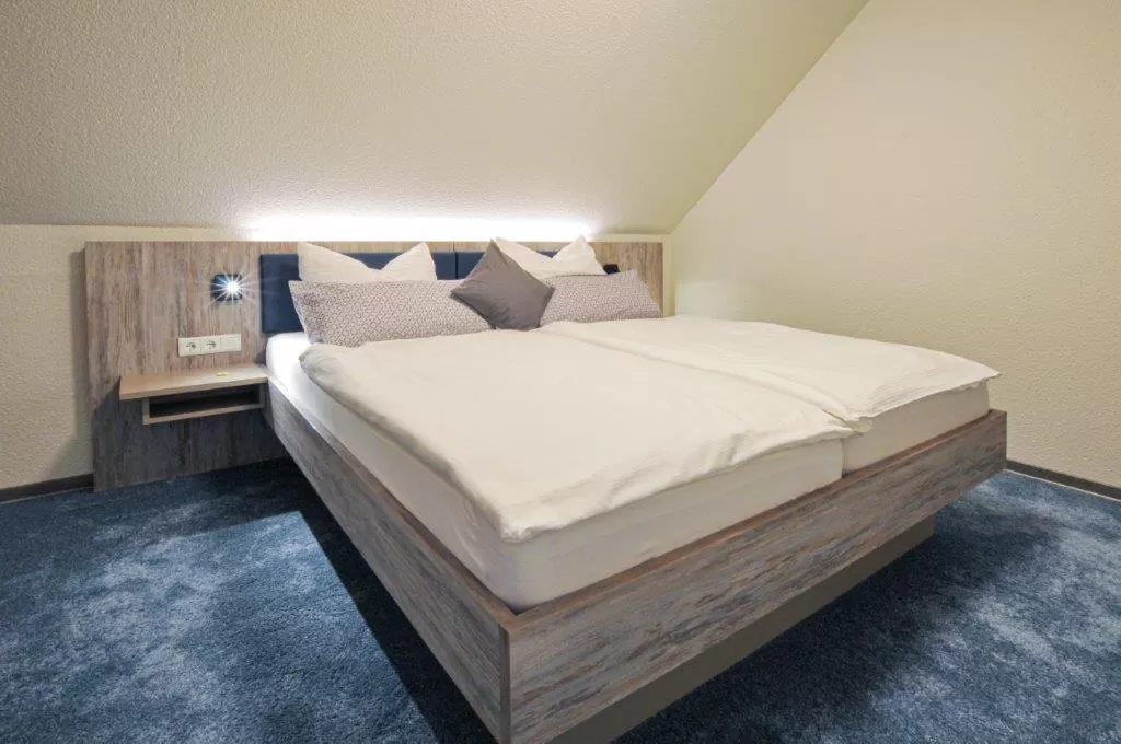 Bed in Hotel Grasberger Hof GmbH