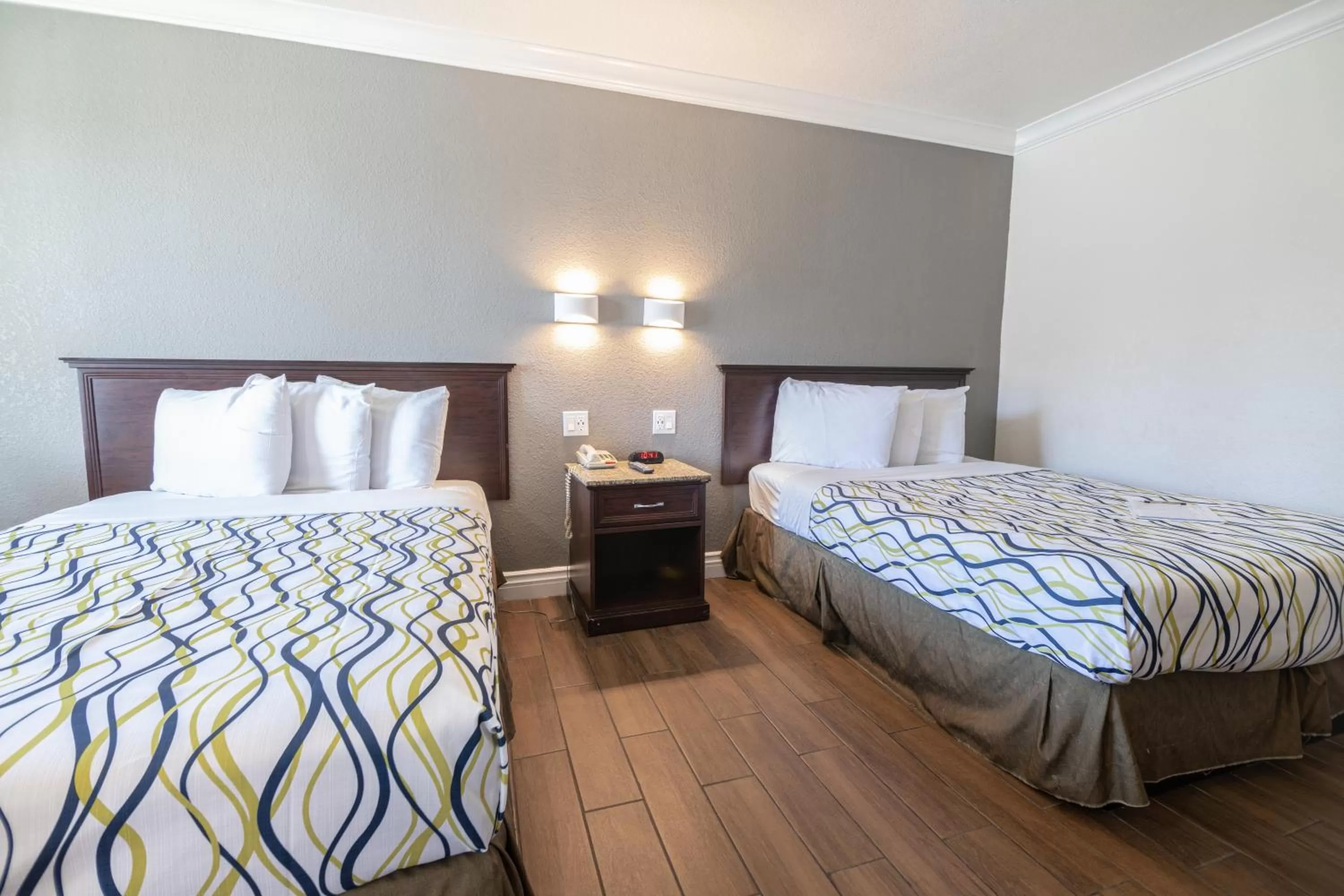 Bed in Hospitality Inn