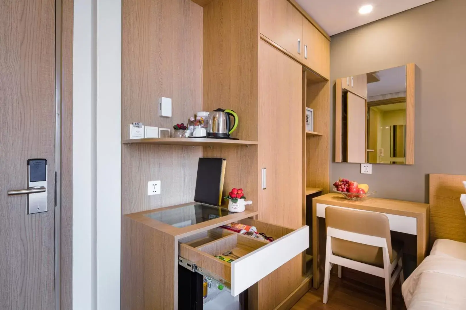 Bedroom, Kitchen/Kitchenette in Smile Hotel Nha Trang