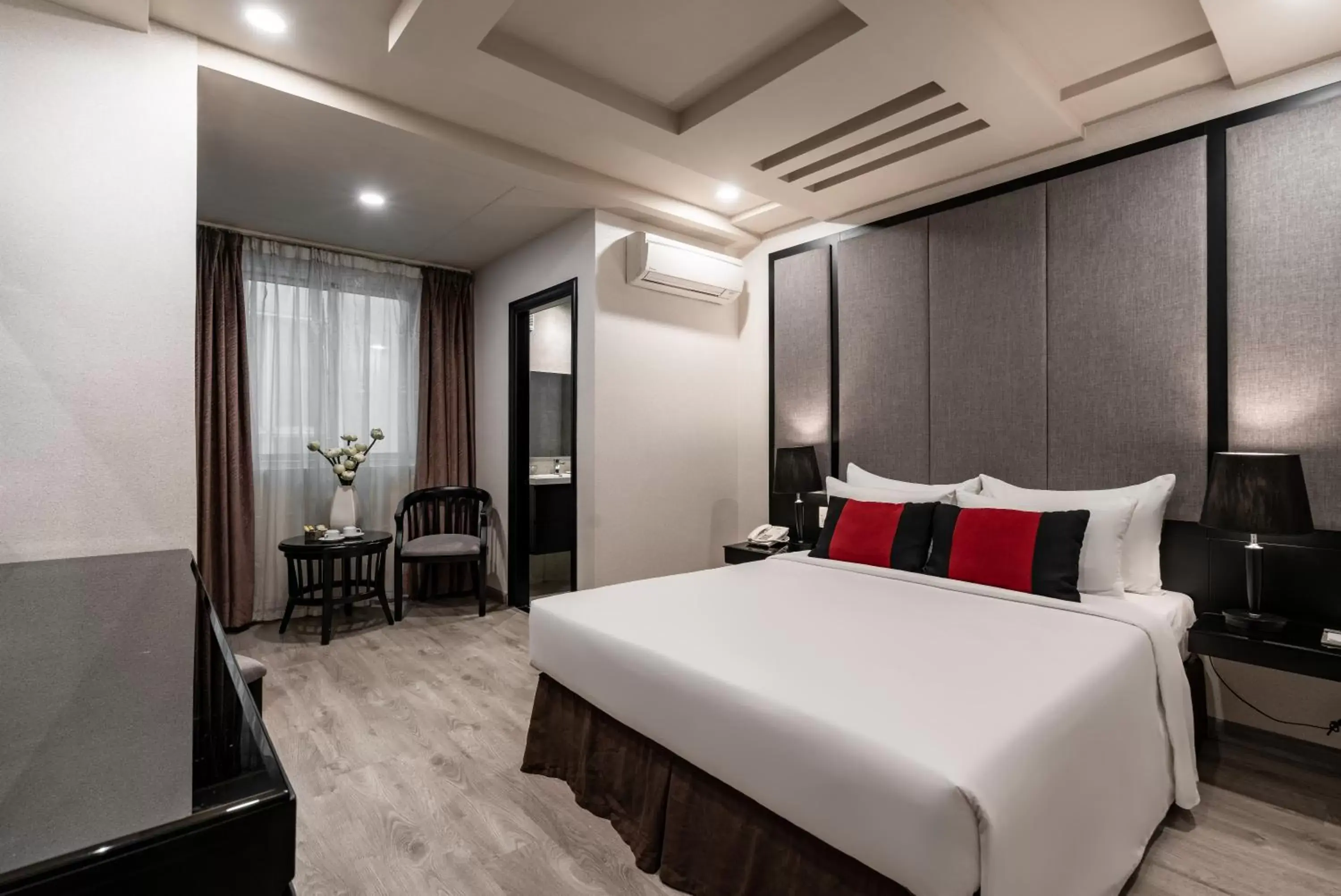 Bed in Paragon Saigon Hotel