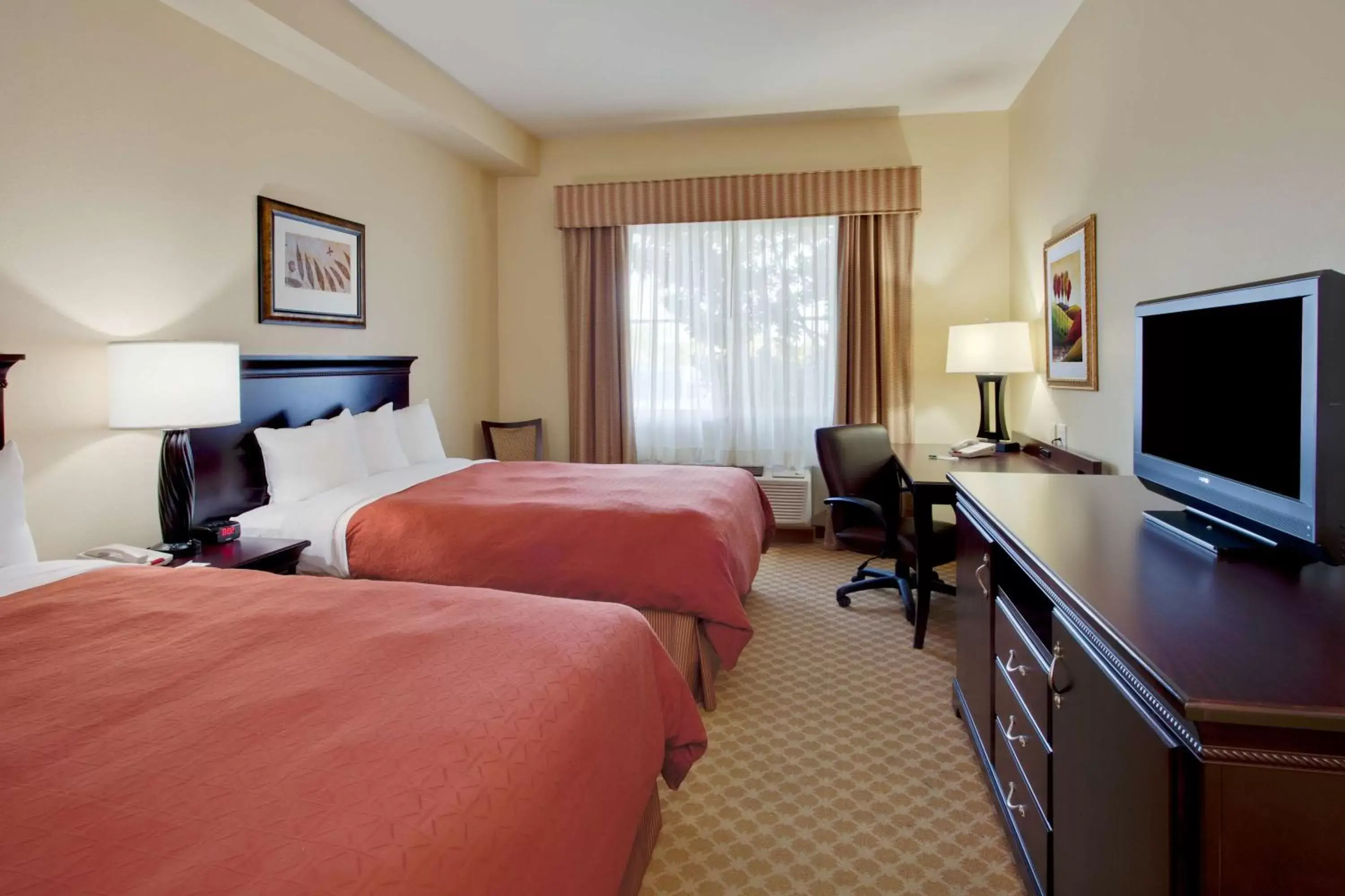 Photo of the whole room, Bed in Country Inn & Suites by Radisson, Port Charlotte, FL