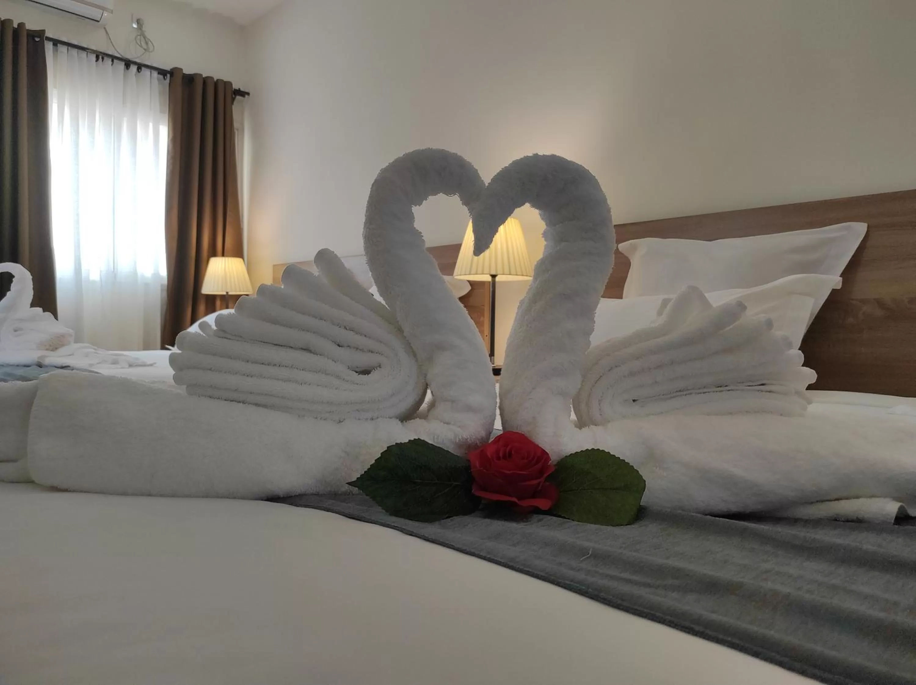 towels, Bed in Downtown Hotel
