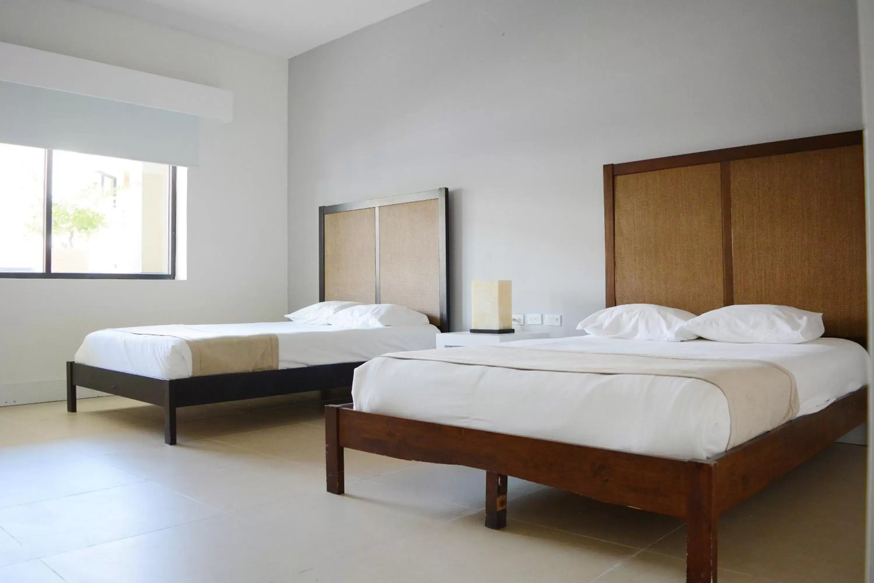 Bed in Aldea Thai