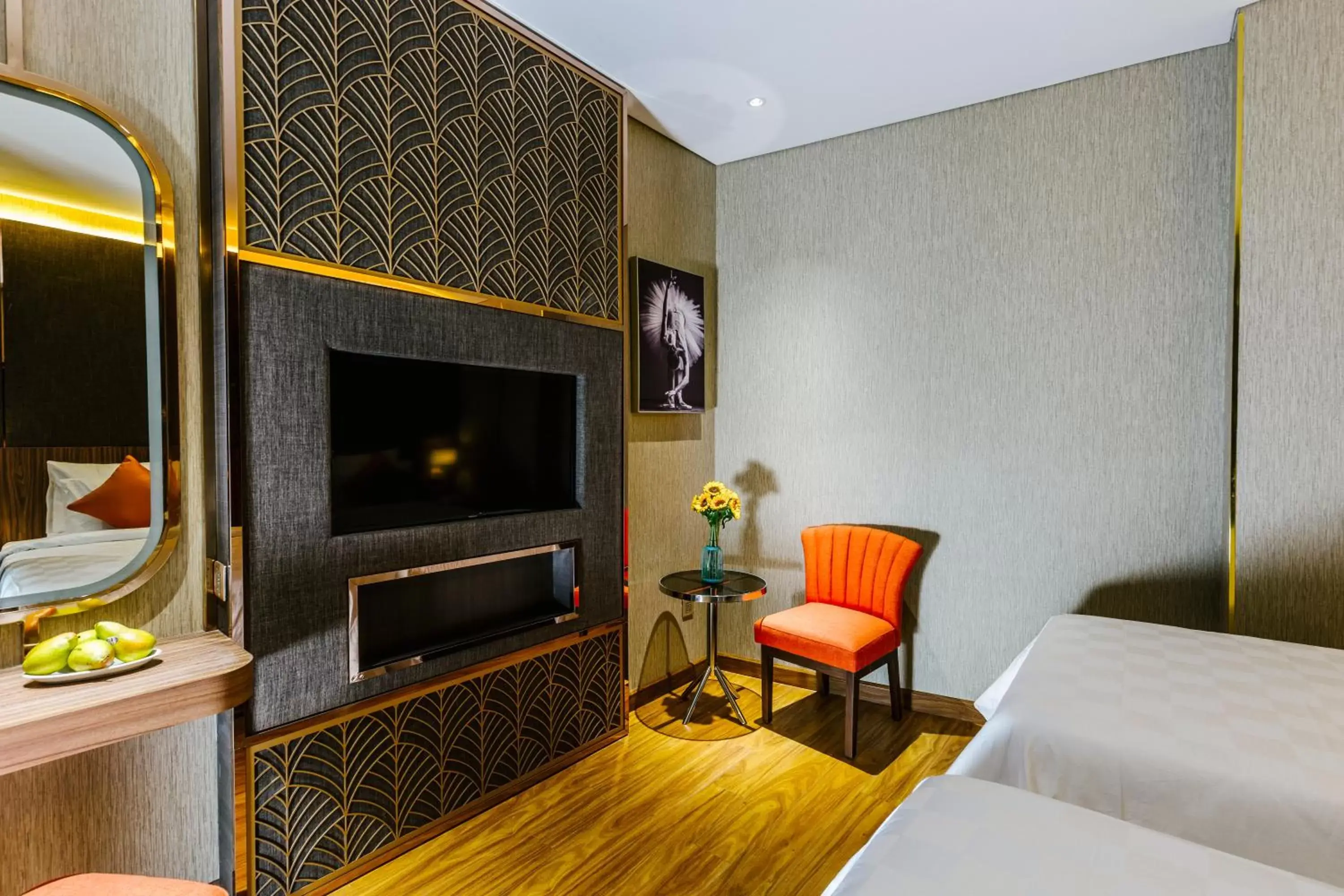 Bedroom, TV/Entertainment Center in Winsuites Saigon