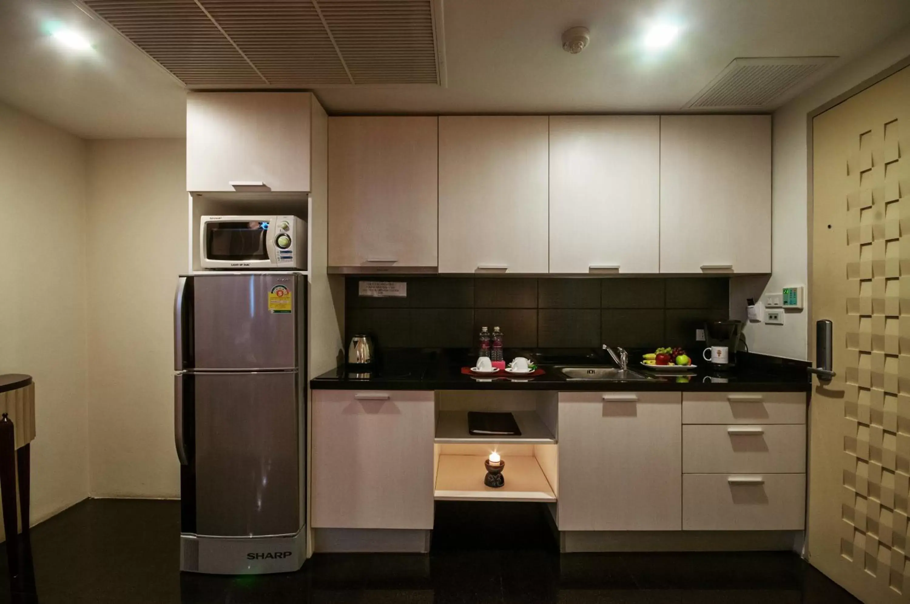 Kitchen or kitchenette, Kitchen/Kitchenette in The Bless Hotel and Residence