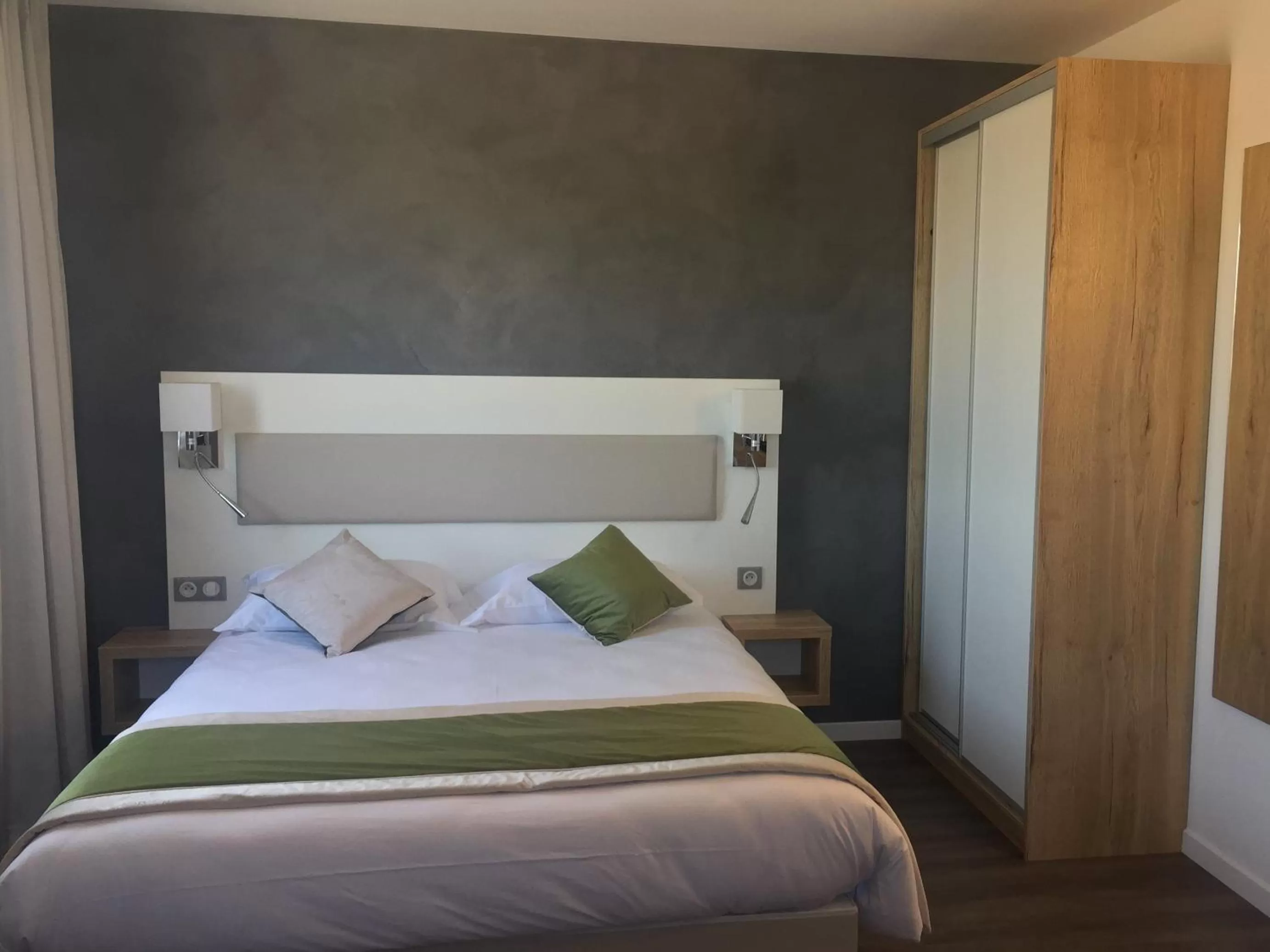 Bed in ATOLON PARK HOTEL