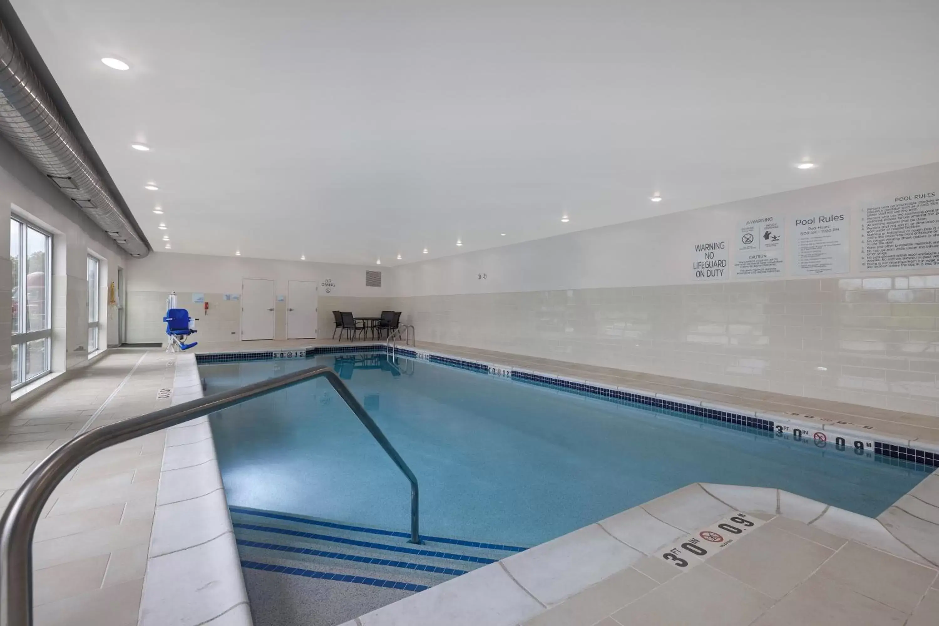 Swimming Pool in Holiday Inn Express & Suites - Brighton South - US 23, an IHG Hotel