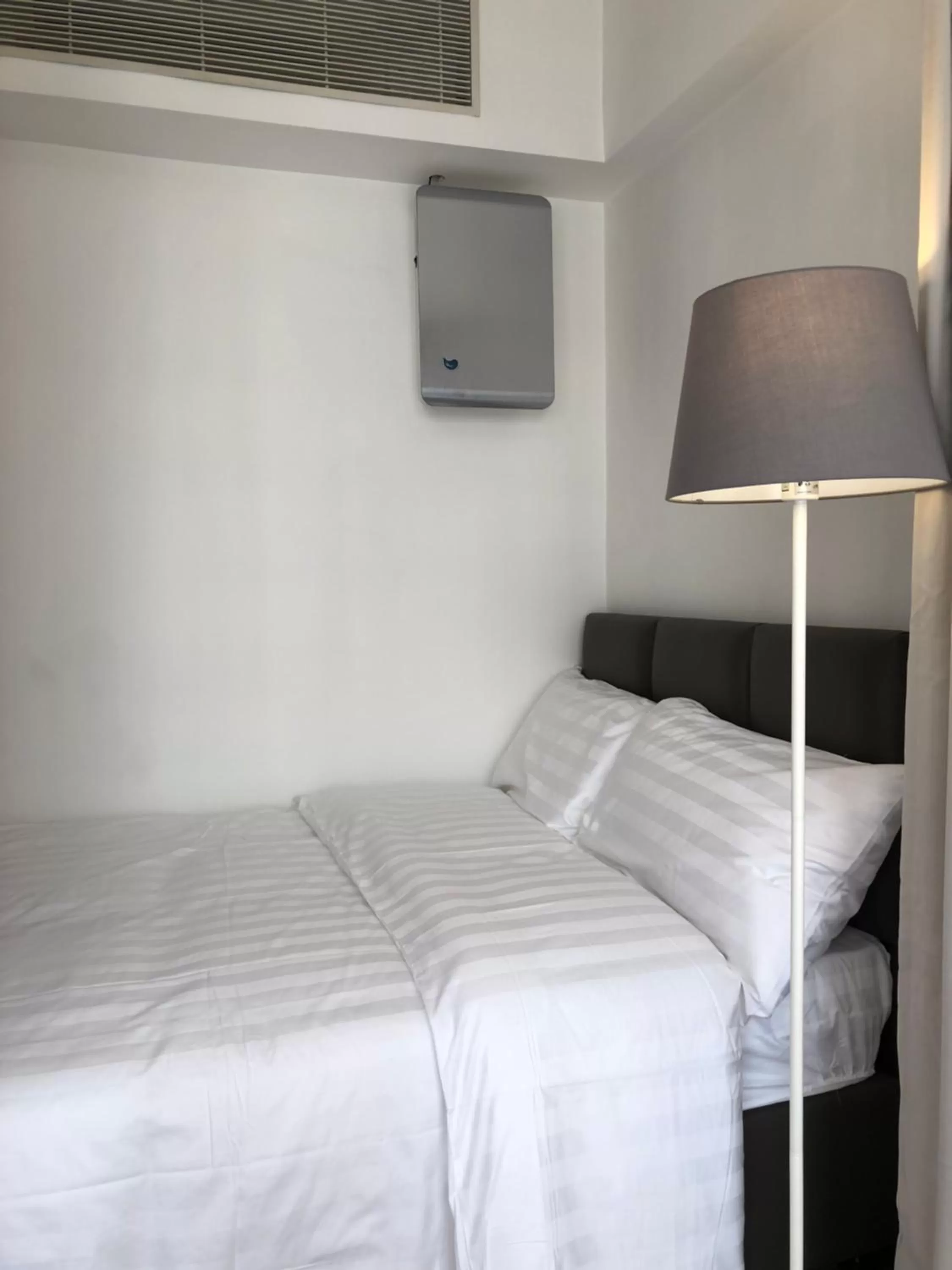 Bed in Homy Residence