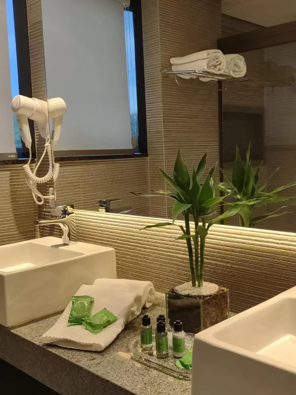 towels, Bathroom in Ramada Hotel & Suites Lagoa Santa By Wyndham