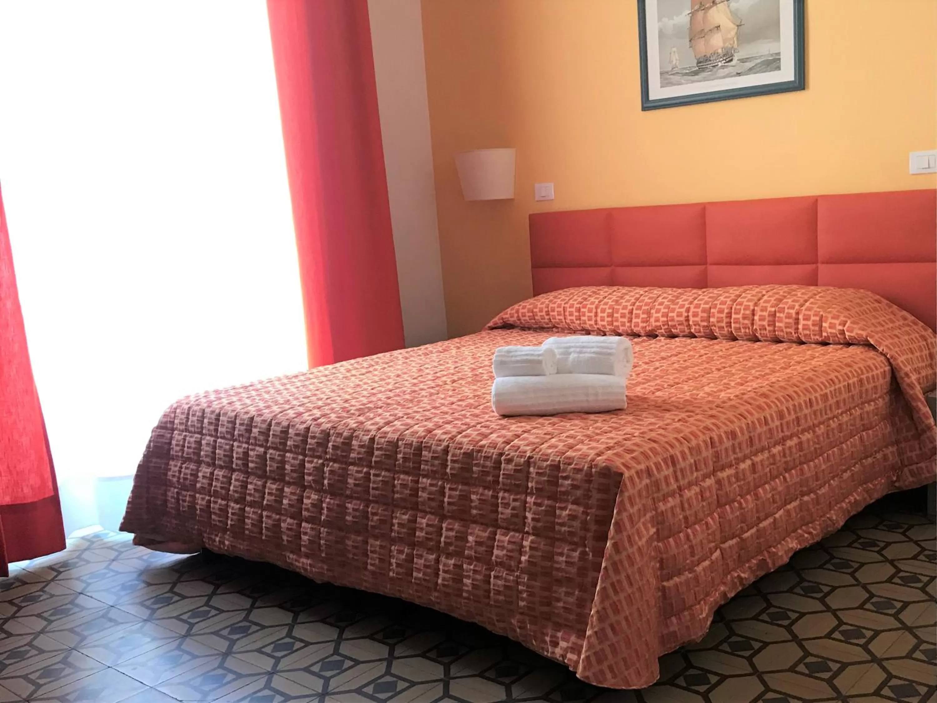 Bedroom in Moonlight Hotel&Suites