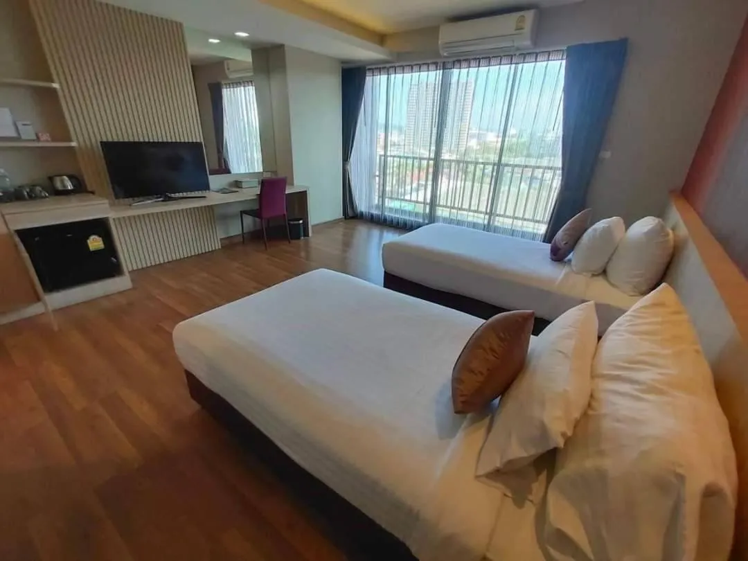 Bed in Tonaoi Grand Hotel