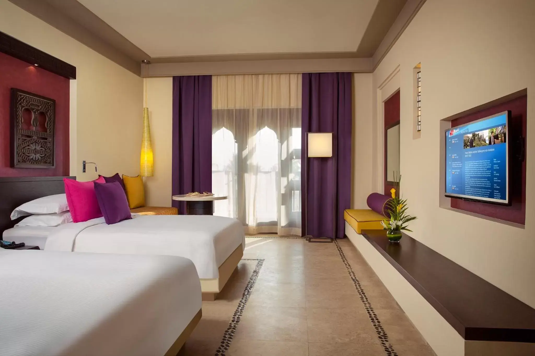 Bed, TV/Entertainment Center in Salalah Rotana Resort