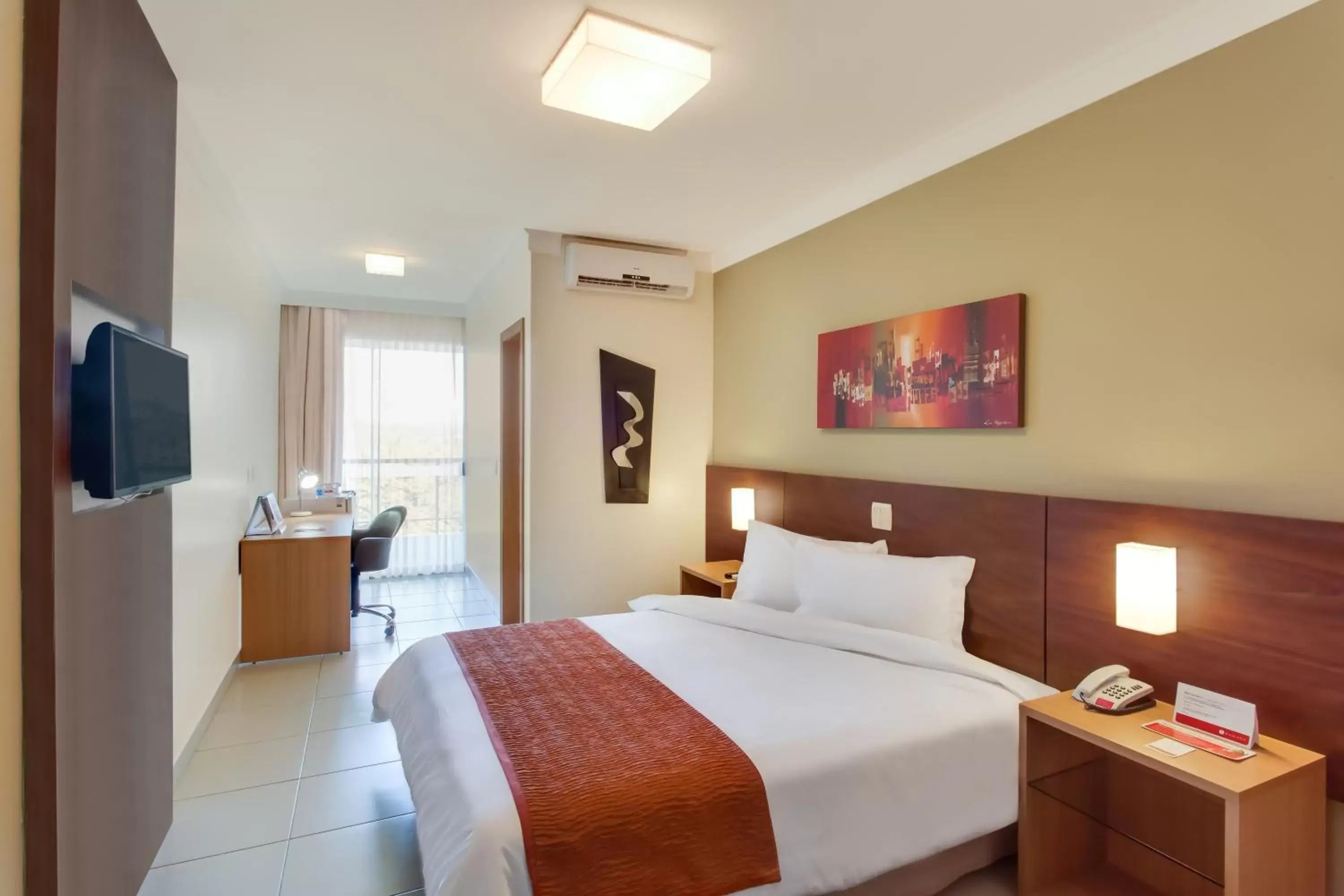 Bed in Ramada Hotel & Suites Lagoa Santa By Wyndham